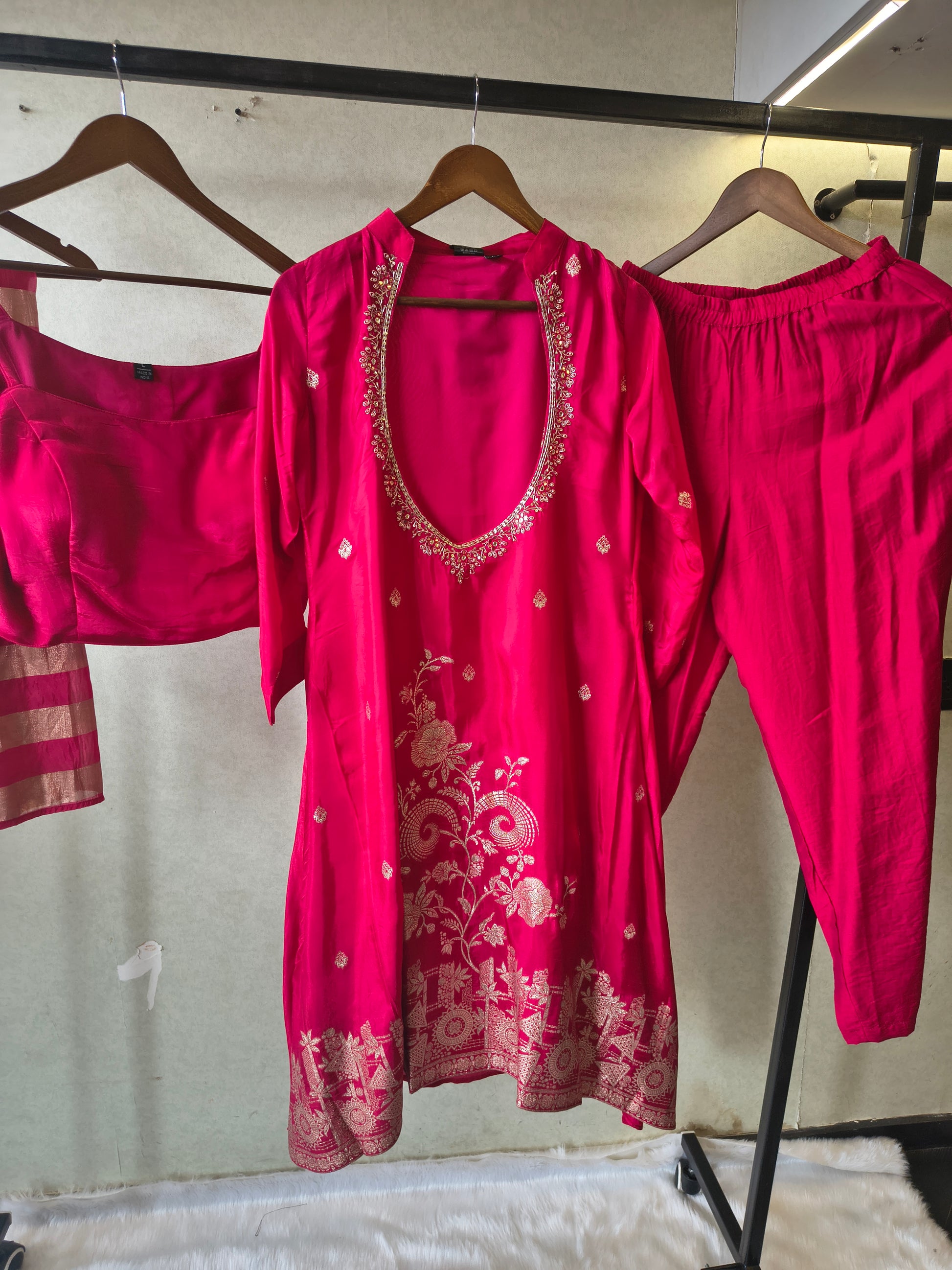 Rani Pink Embroidered Asymmetrical Kurta with Inner, Cigarette Pants & Metallic Striped Dupatta – 4 Piece Designer Festive Set