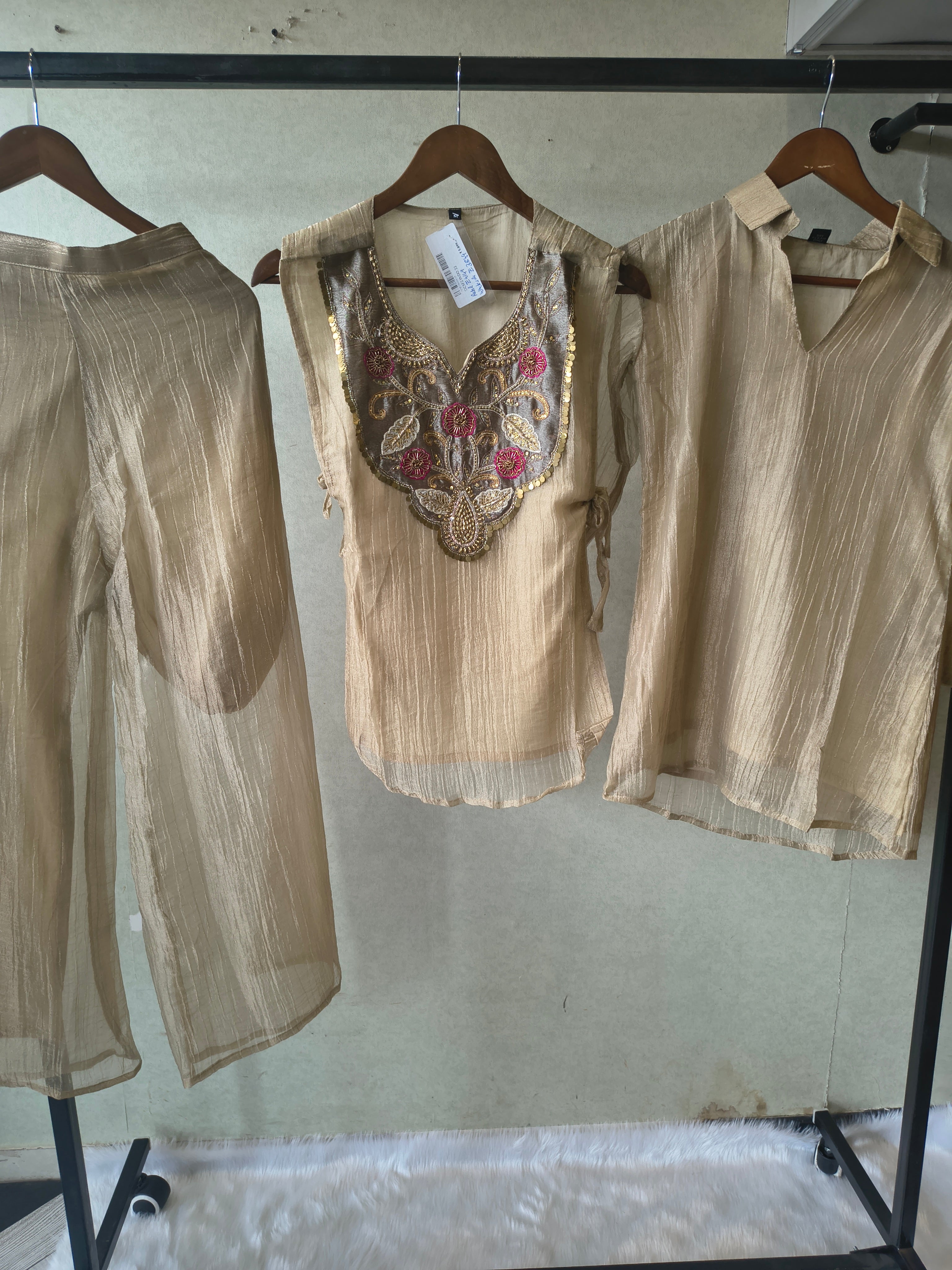 Image of Premium Champagne Tissue Silk Embroidered Kurta with Hand Embellished Statement Yoke