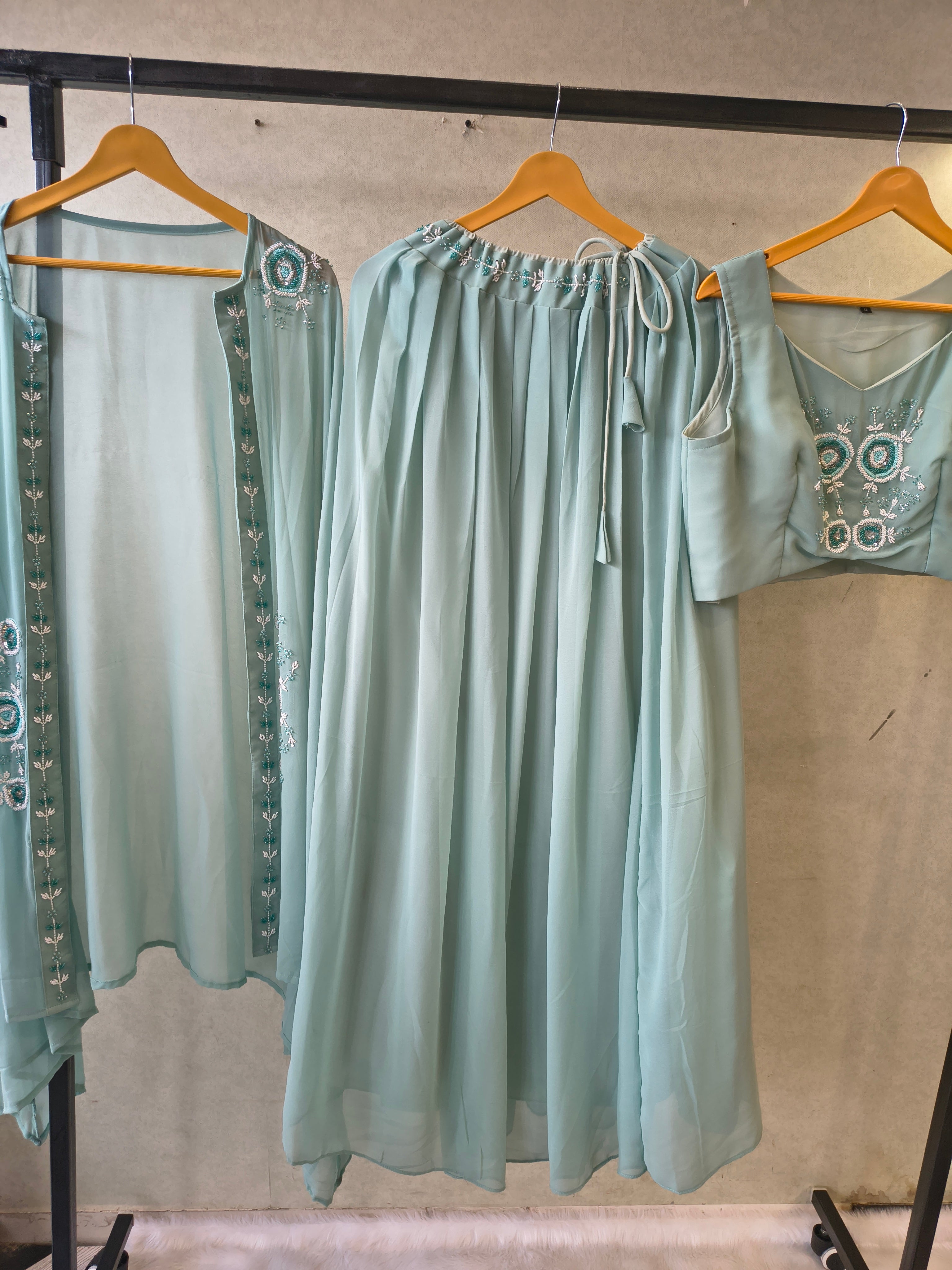 Image of Powder Blue Designer Crop Top Sharara Set with Embroidered Cape & Flared Palazzo | Premium 3 Piece Occasion Wear