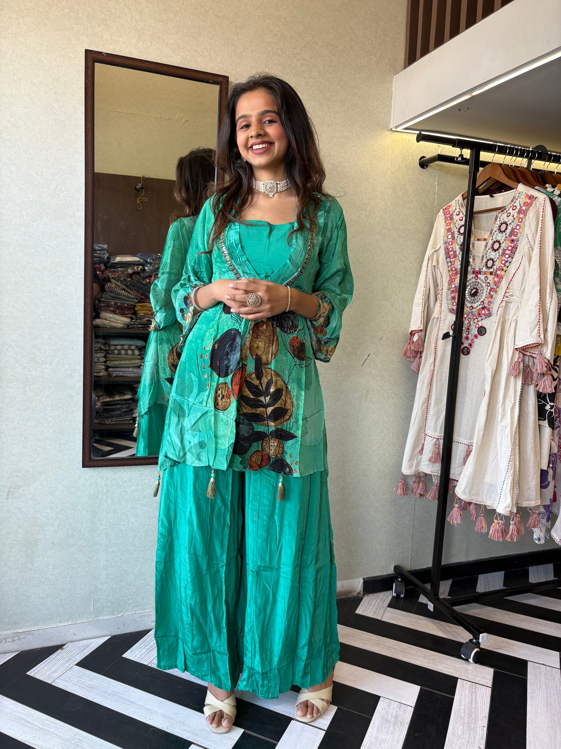 Step into the celebration with our Designer Crepe 2-Piece Set in a refreshing green hue, crafted with intricate detailing and effortless grace