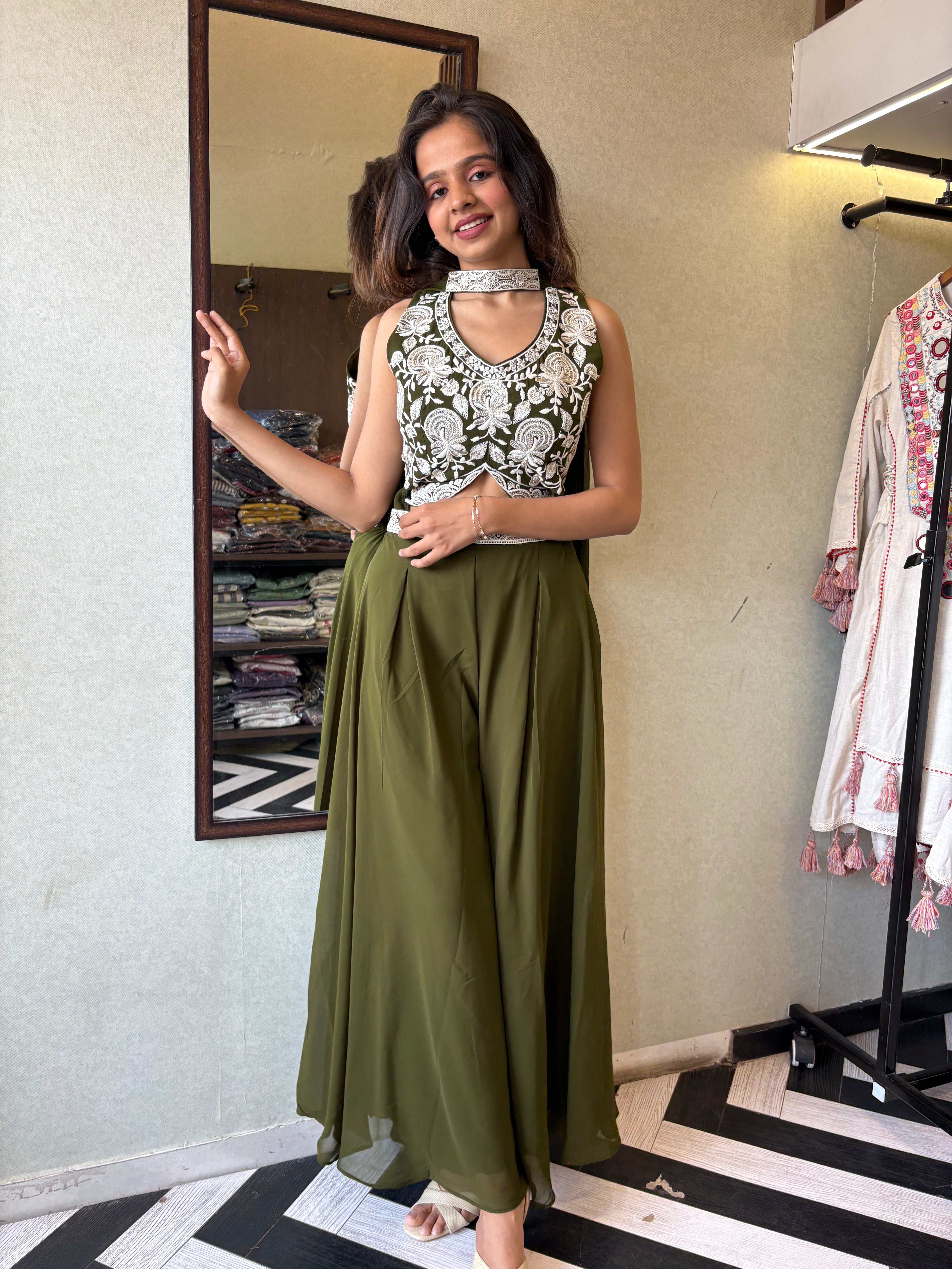 Our 2-piece Indo-Western stunner - crafted in pure georgette with a fully embroidered blouse and a beautifully flowing drape-style bottom that blends Indian grace with modern charm!