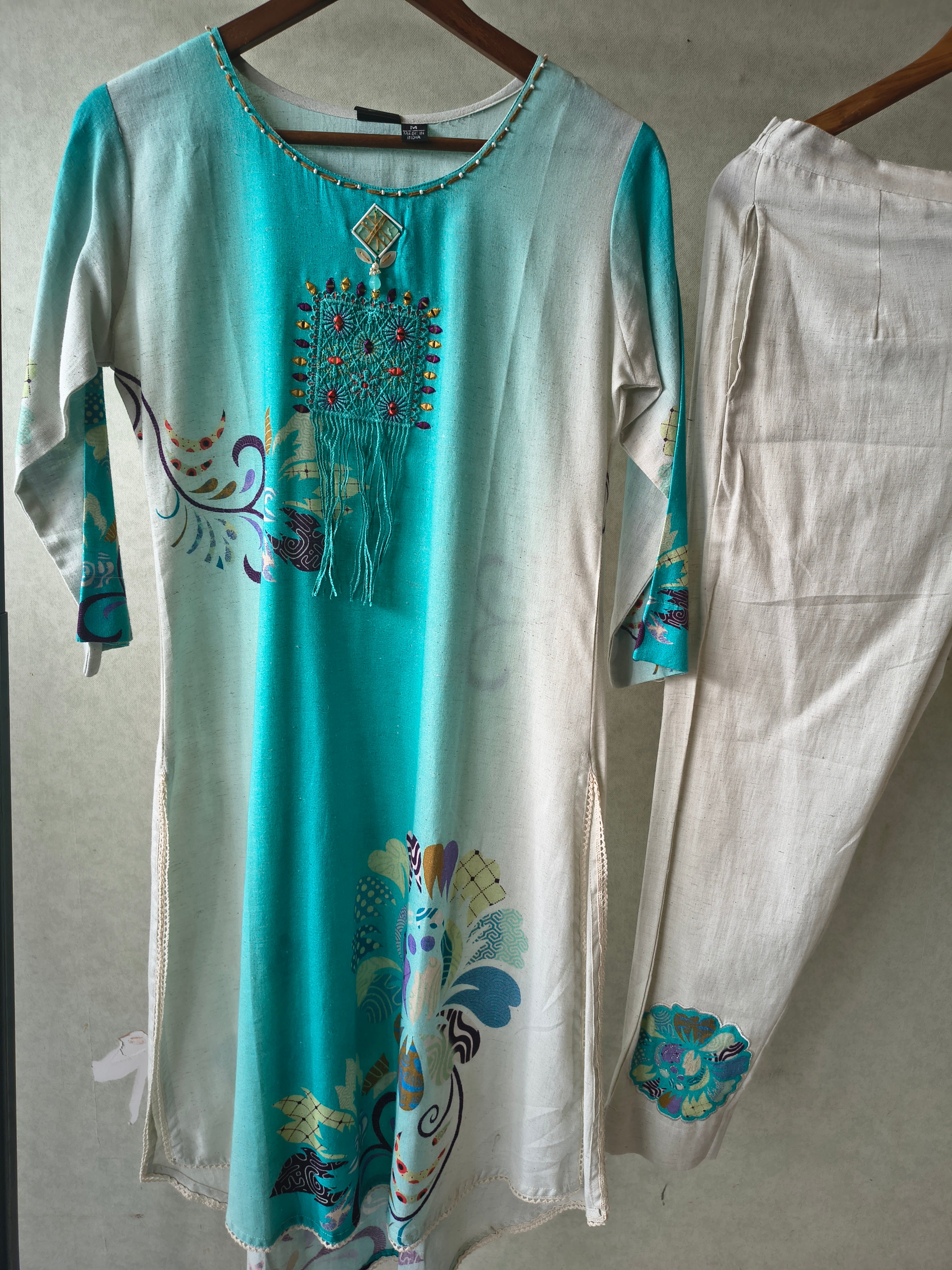 Image of Premium Aqua Ombre Linen Blend Kurta Set with Handcrafted Embroidered Tassel Patch & Embroidered Pants