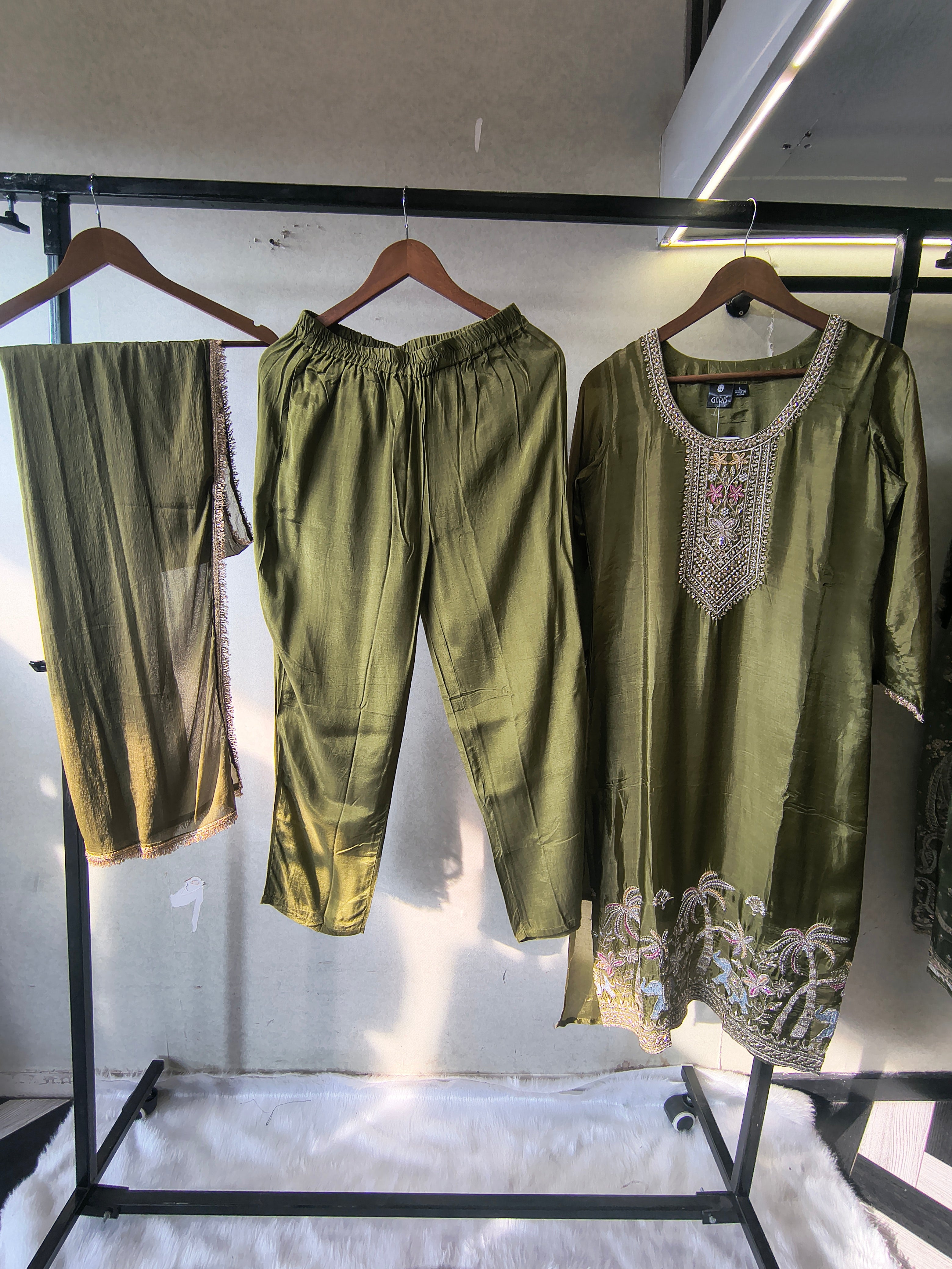 Image of Olive Green Embroidered Straight Kurta Set with Designer Yoke, Scenic Hem Embroidery & Lace Border Dupatta – Premium 3 Piece Ethnic Ensemble