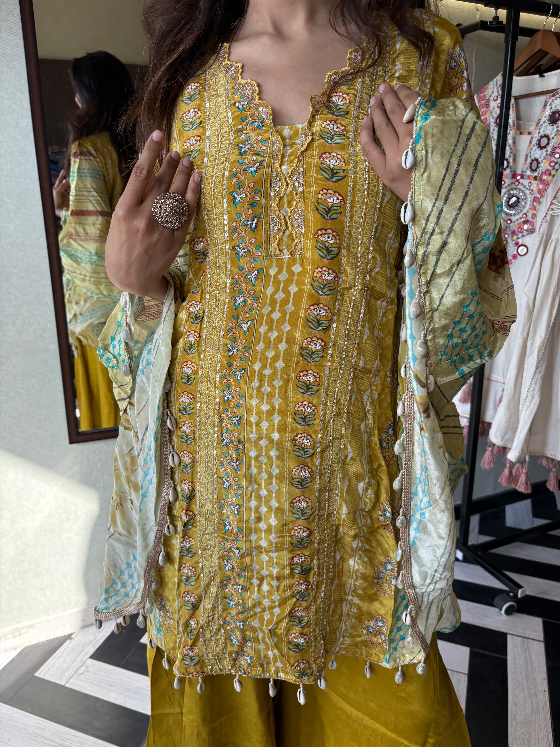 Crafted from pure crepe fabric with hand-sequenced accessory work - it's the sunshine outfit your wardrobe needs!