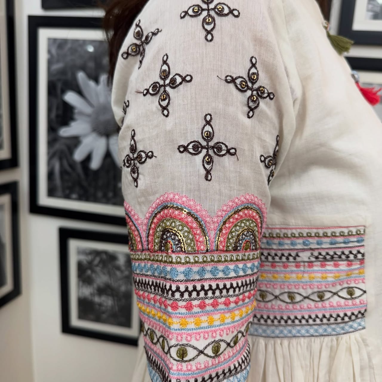 Aline kurta Style made from high-quality cotton flex, embellished with sequance embroidery work on hand sleeves and side line and paired with matching pant.