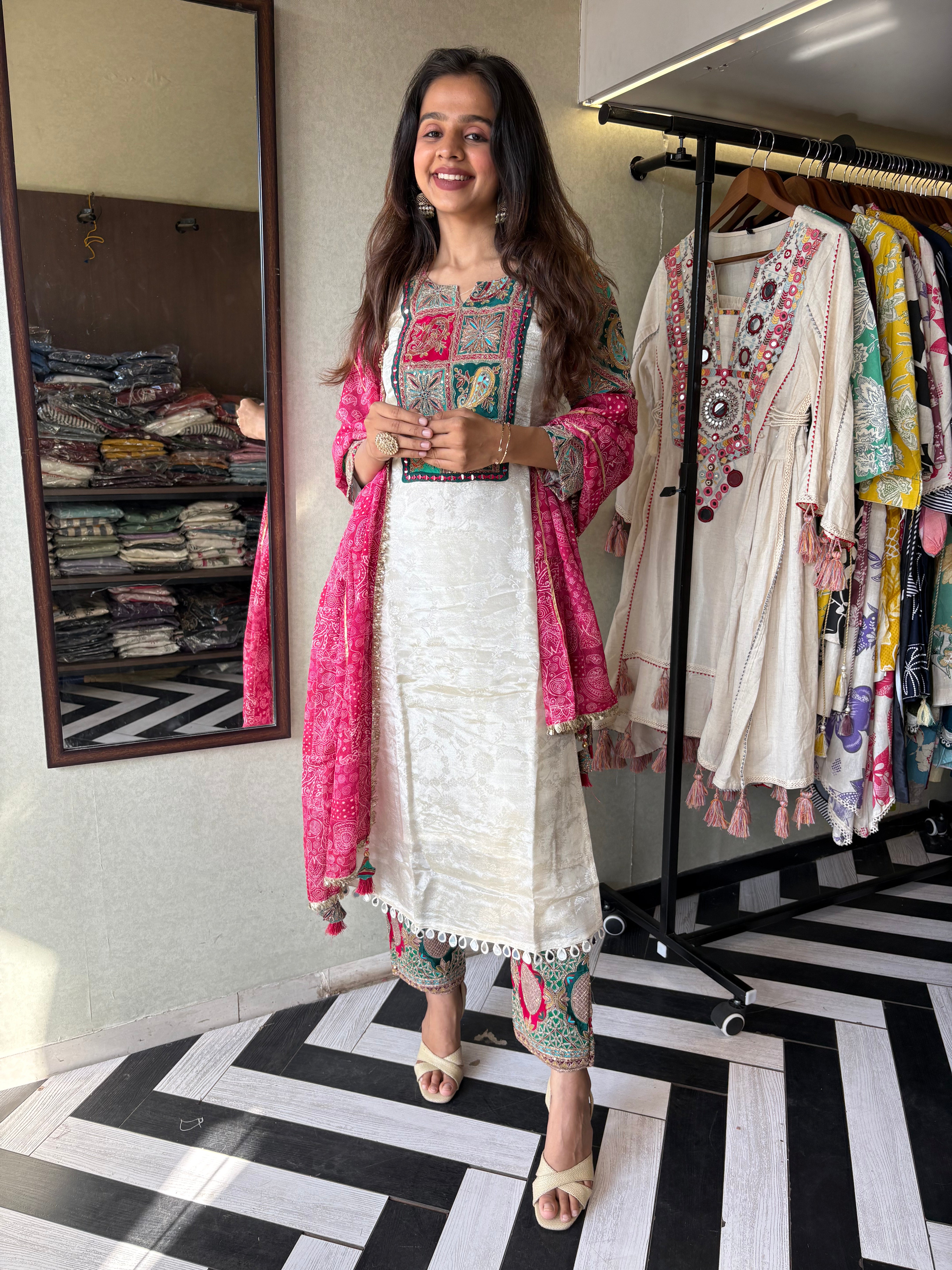 Step into elegance with this Shimmer Kurti Set - featuring weaving detail and pure hand mirror work that brings grace and glam together!