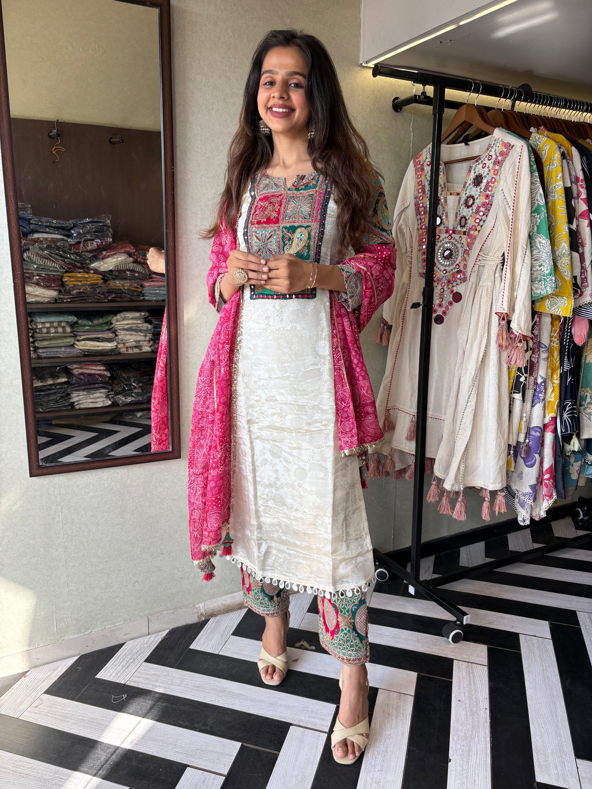 Step into elegance with this Shimmer Kurti Set - featuring weaving detail and pure hand mirror work that brings grace and glam together!