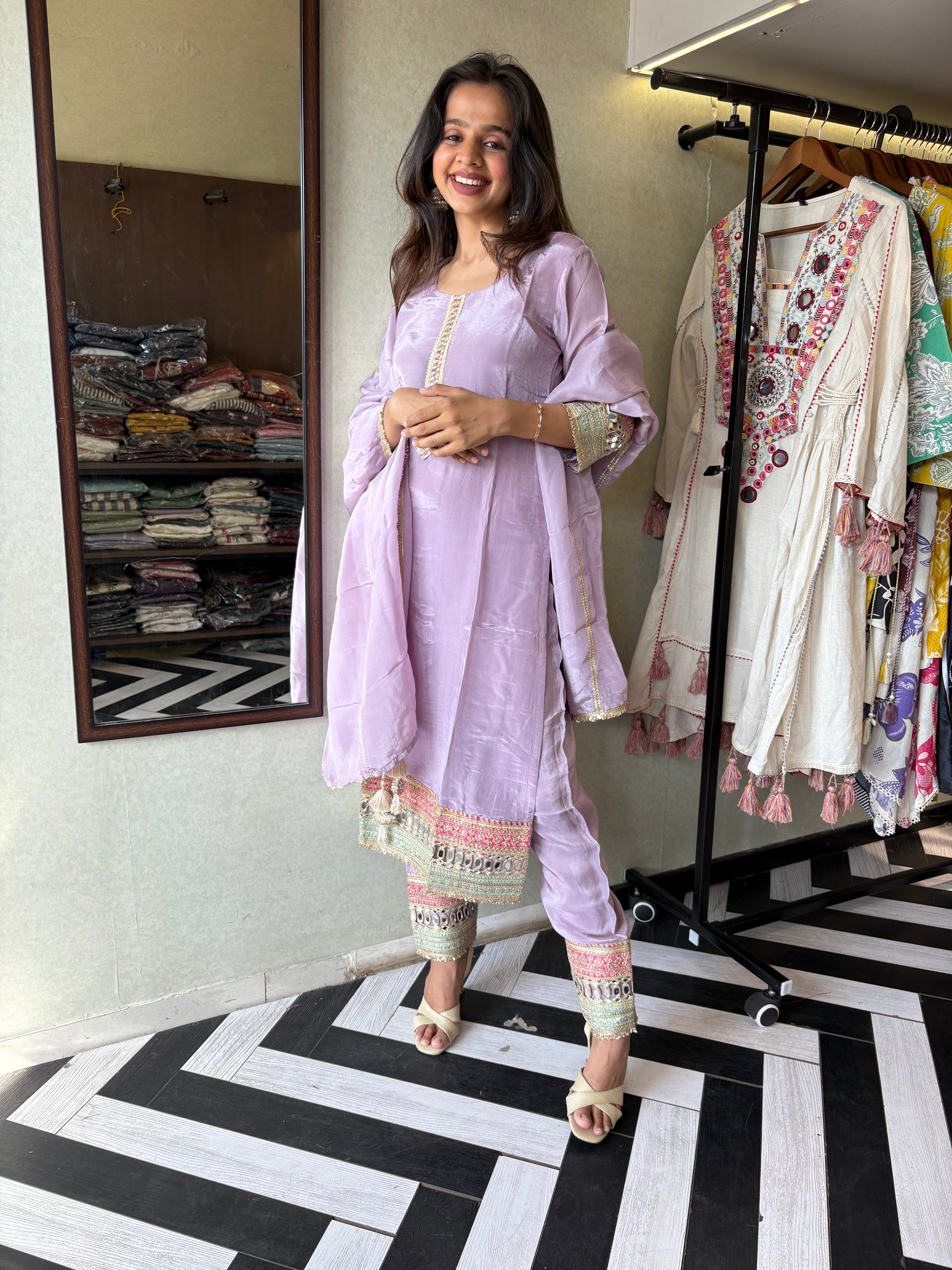 Image of Shine Bright in Royal Magenta!

Crafted in pure silk crepe, this designer straight-cut kurti set is finished with mirror handwork on sleeves and pant ends - a perfect blend of subtle glam and timeless class.
