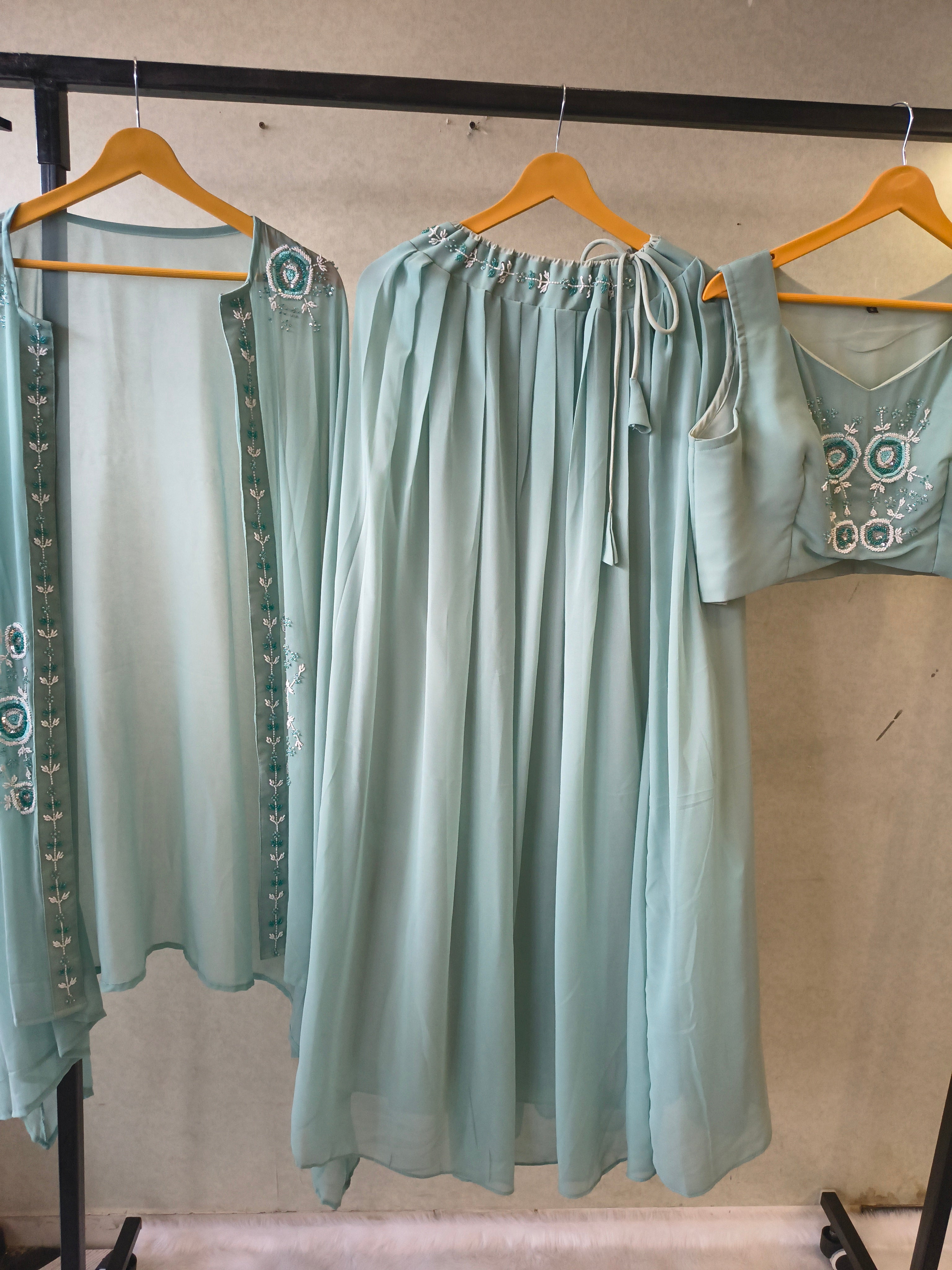 Image of Powder Blue Designer Crop Top Sharara Set with Embroidered Cape & Flared Palazzo | Premium 3 Piece Occasion Wear