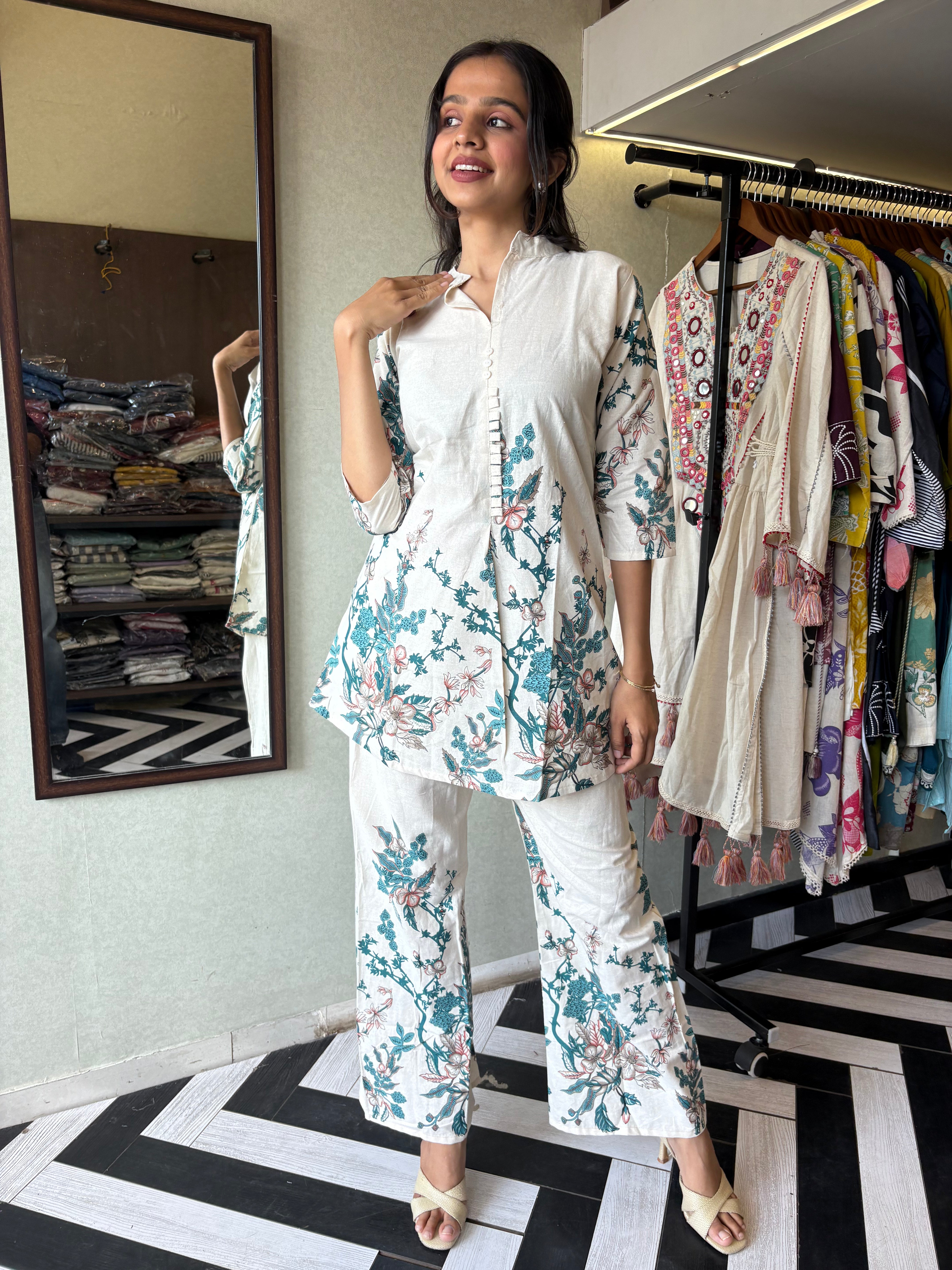 Image of This pure cotton co-ord set in a designer white print is your summer savior - soft on the skin, bold on fashion