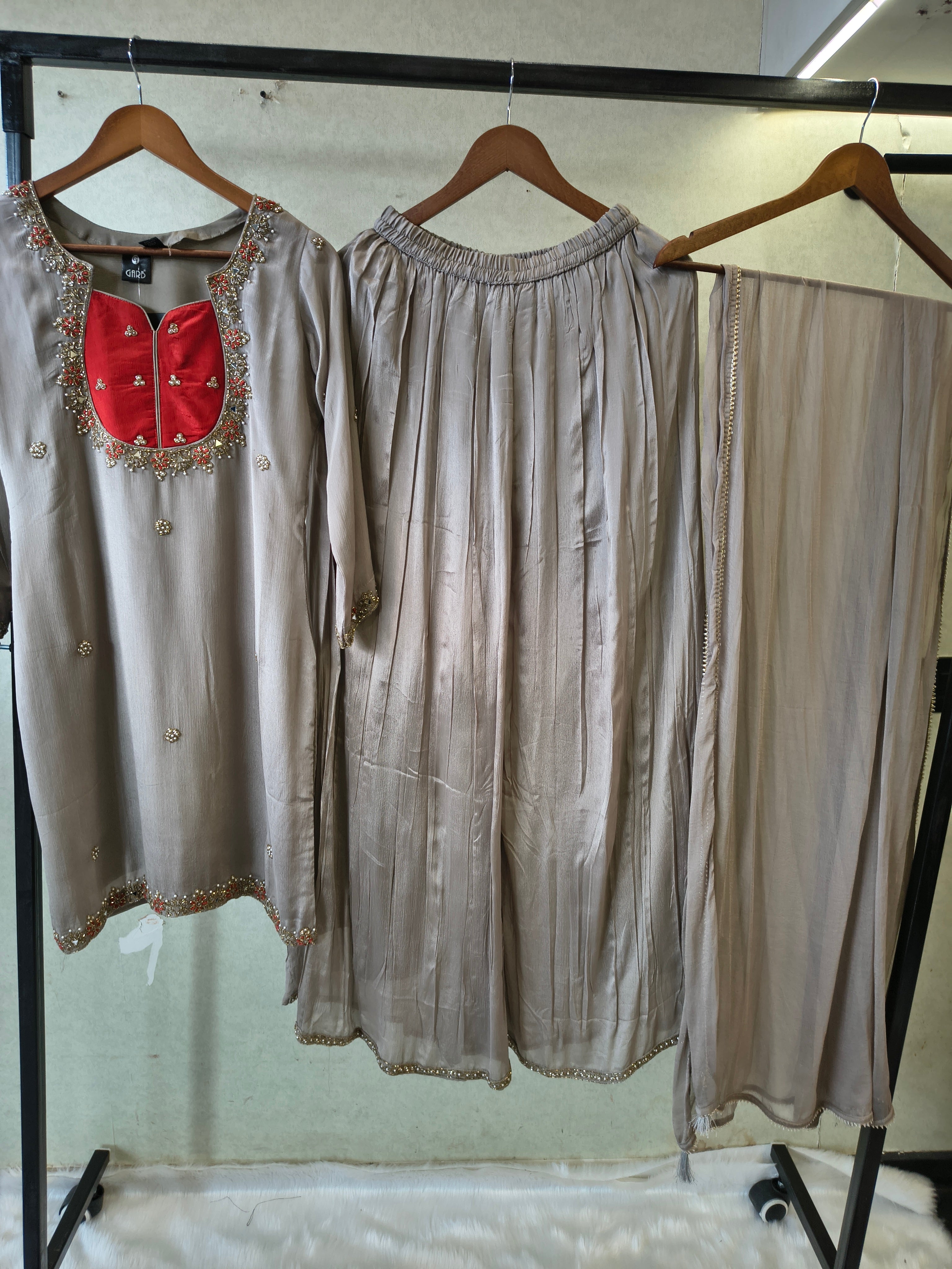 Image of Pearl Grey Embellished Straight Kurta Set with Handcrafted Neckline, Wide Palazzo & Chiffon Dupatta | Premium 3 Piece Festive Ensemble