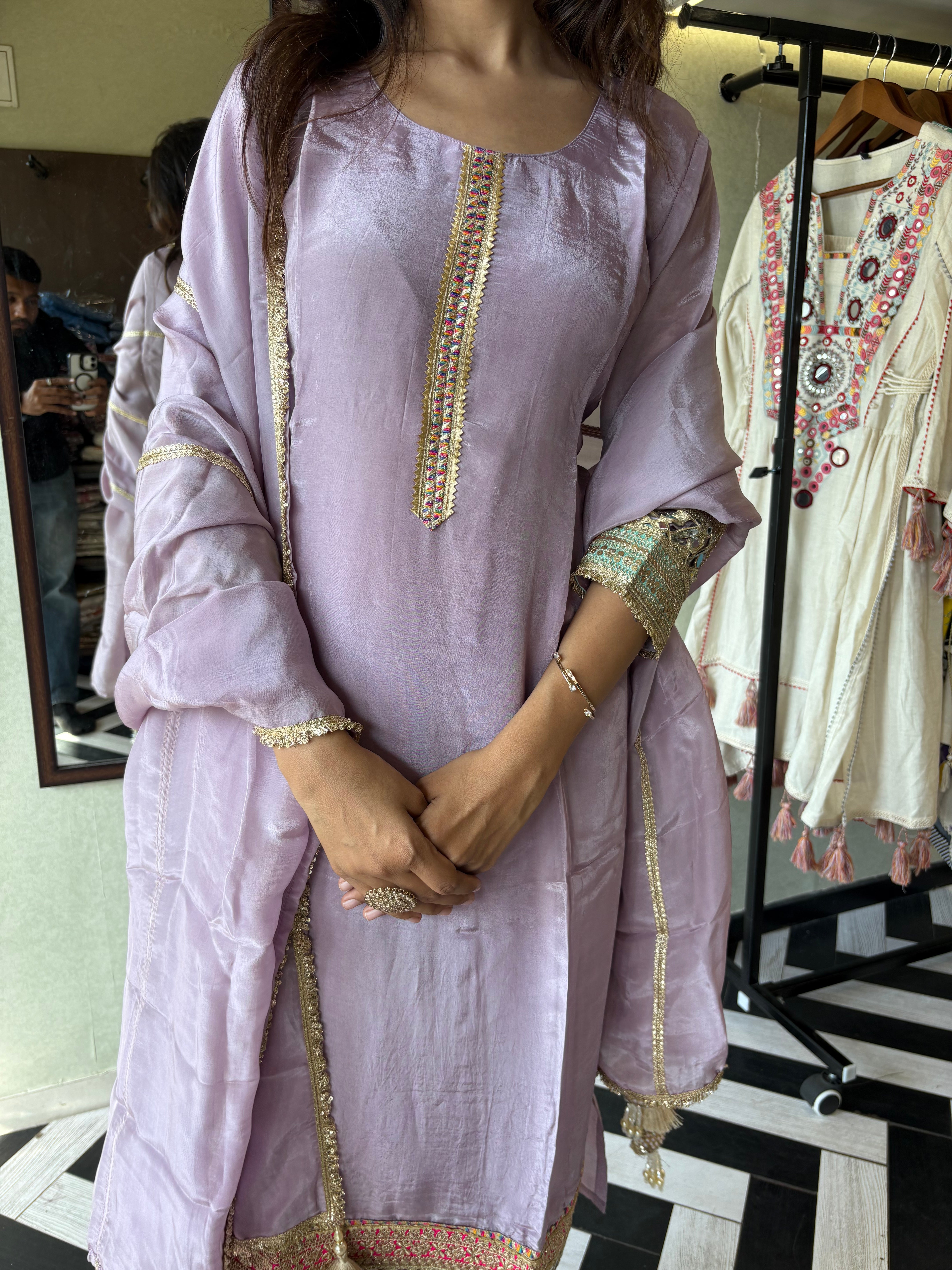 Shine Bright in Royal Magenta!

Crafted in pure silk crepe, this designer straight-cut kurti set is finished with mirror handwork on sleeves and pant ends - a perfect blend of subtle glam and timeless class.