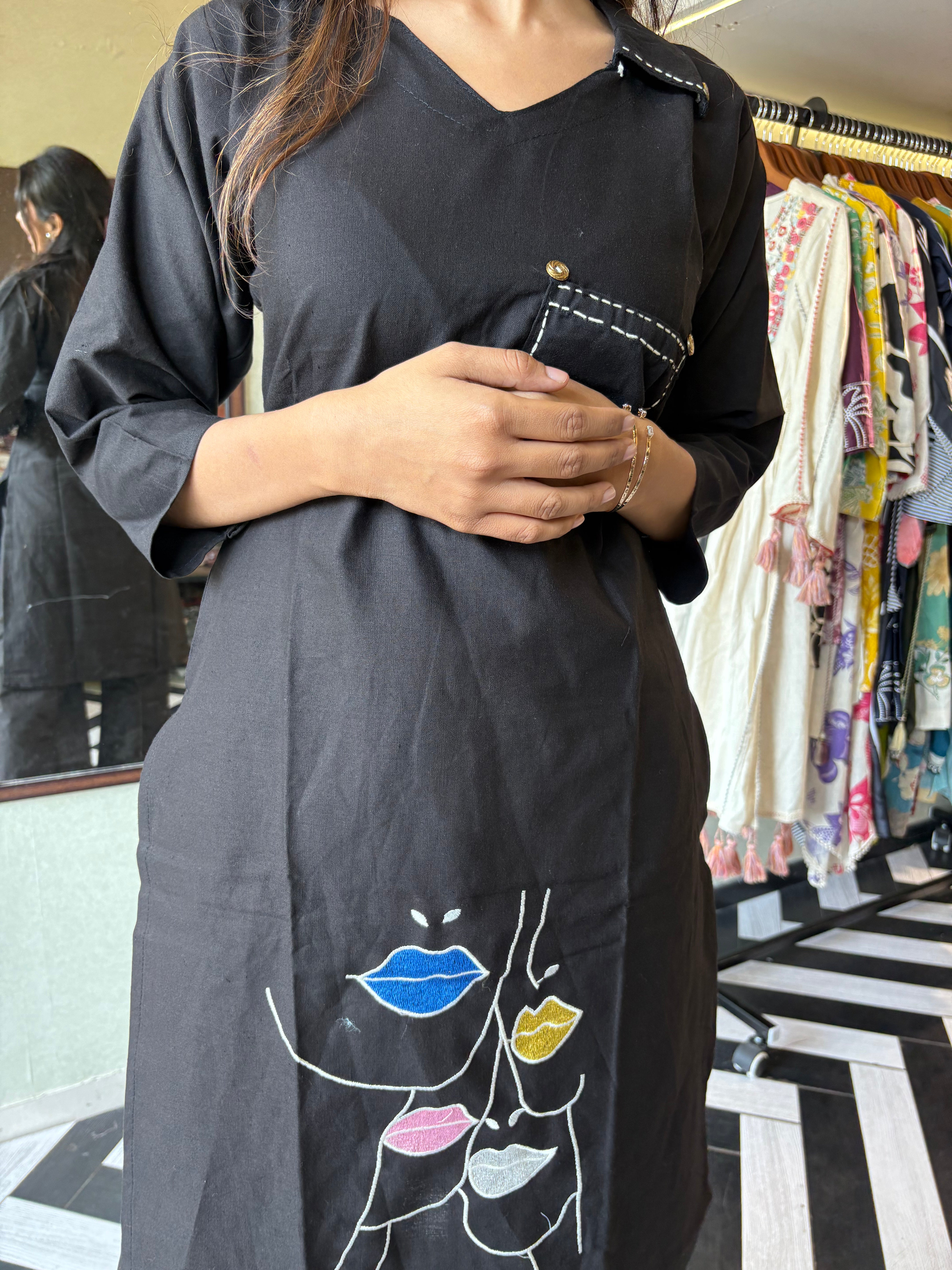 Image of pure cotton black co-ord set, elevated with elegant embroidery detailing. It's a wardrobe must-have that looks premium