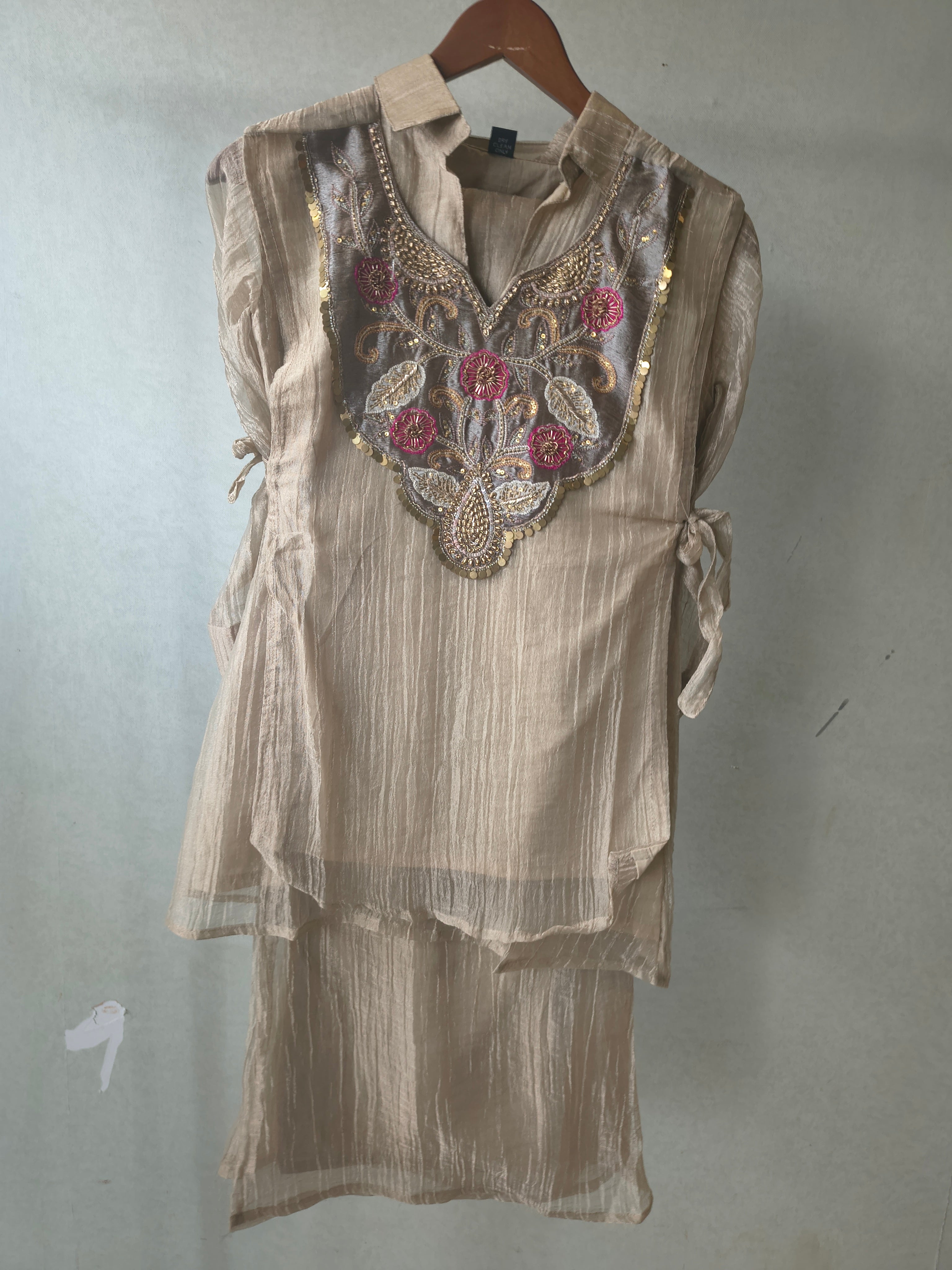 Image of Premium Champagne Tissue Silk Embroidered Kurta with Hand Embellished Statement Yoke