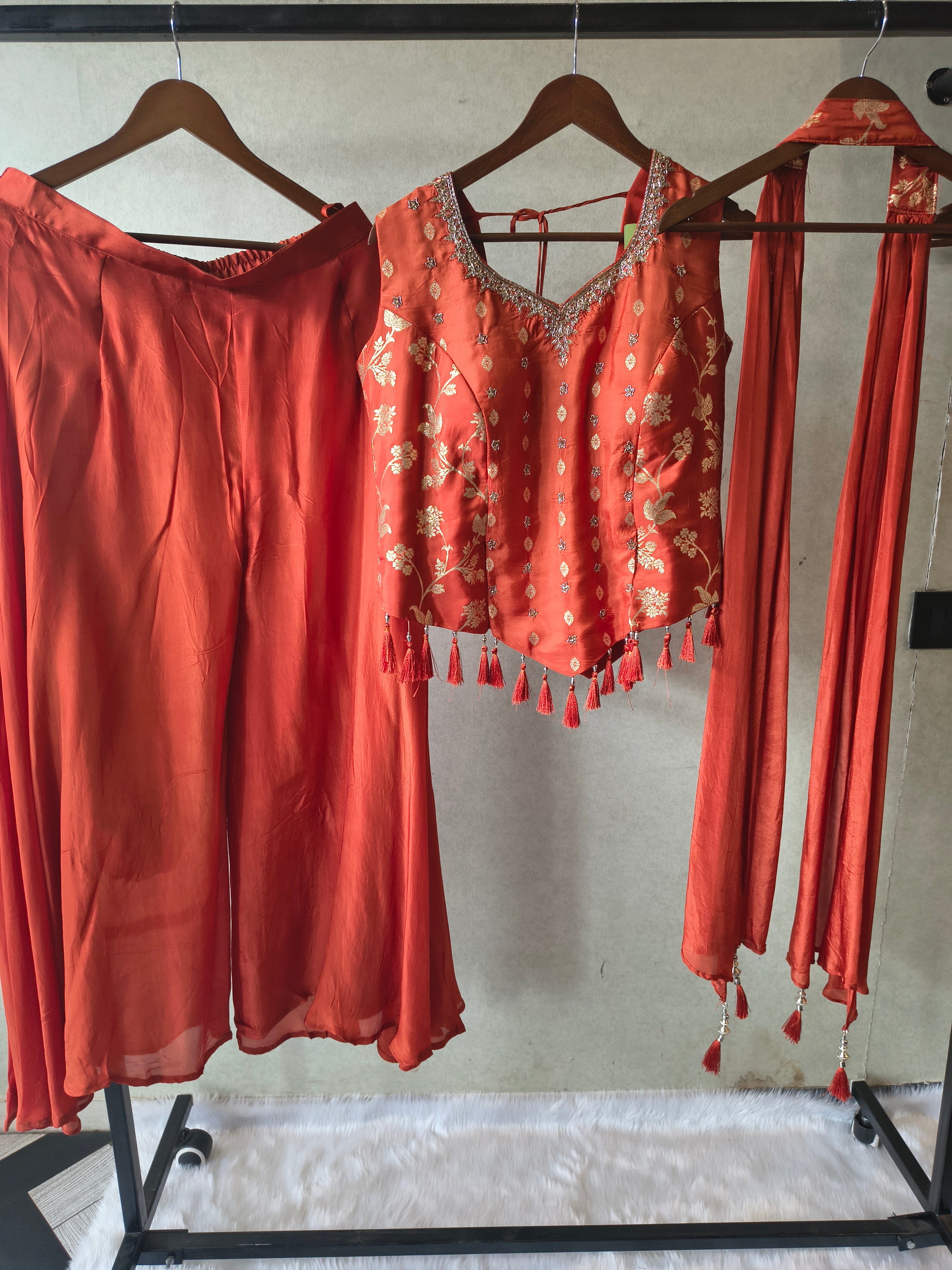 Image of Premium Rust Orange 3-Piece Designer Lehenga Set with Zari Embroidered Peplum Blouse & Tassel Dupatta