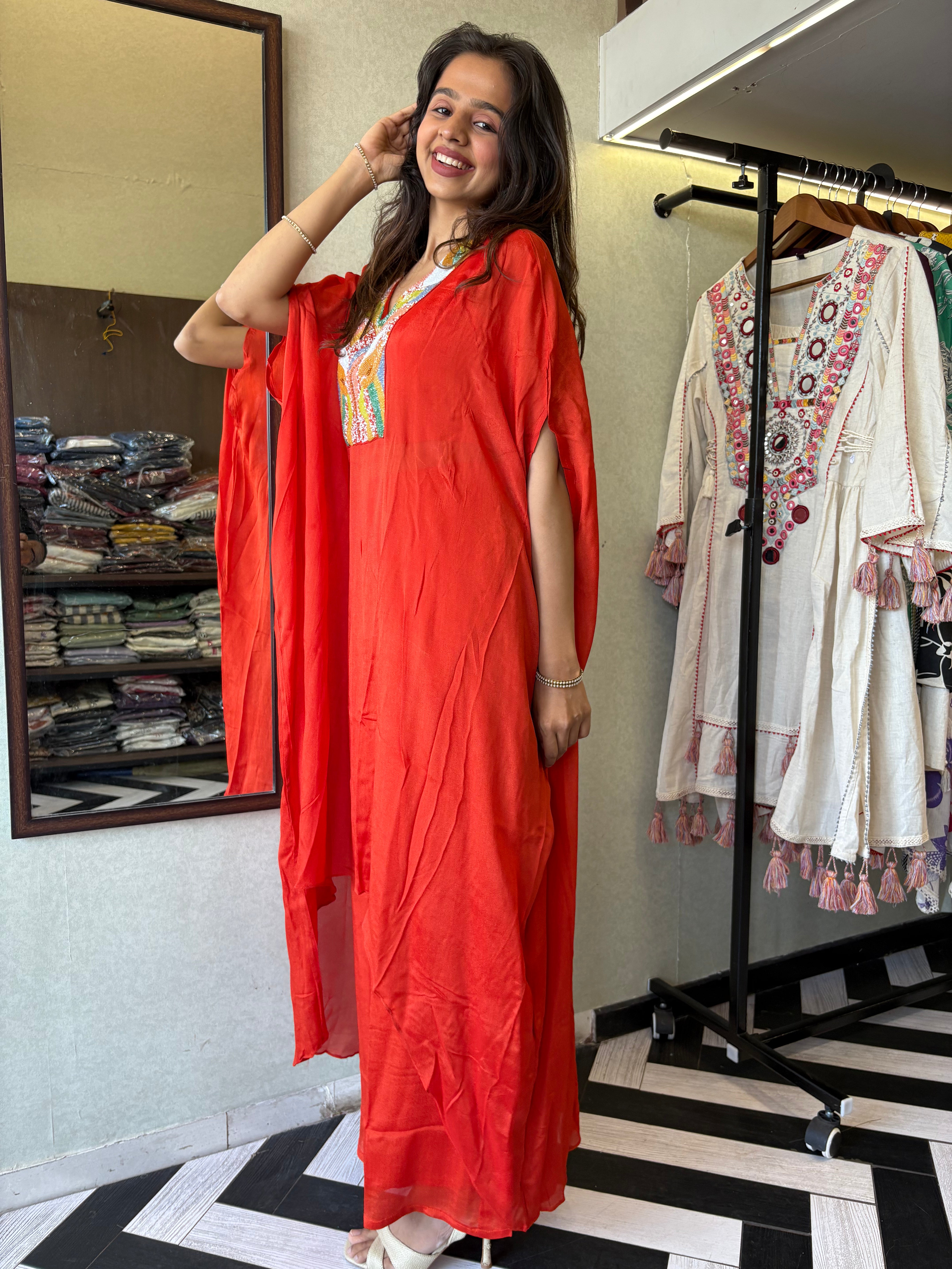 Image of Step into the spotlight in this premium 2-piece Indo-Western set in a breathtaking orange rust hue.