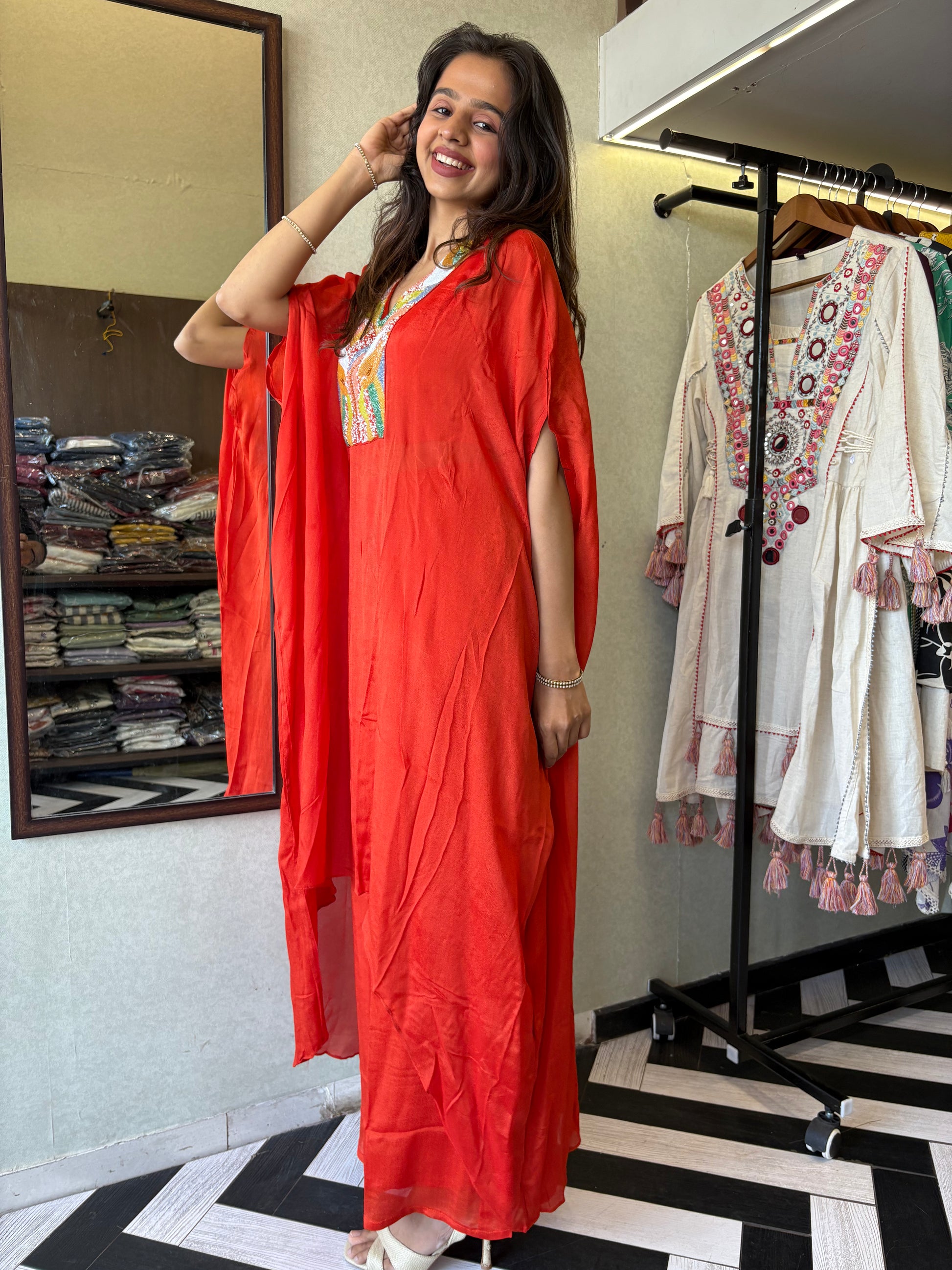 Step into the spotlight in this premium 2-piece Indo-Western set in a breathtaking orange rust hue.