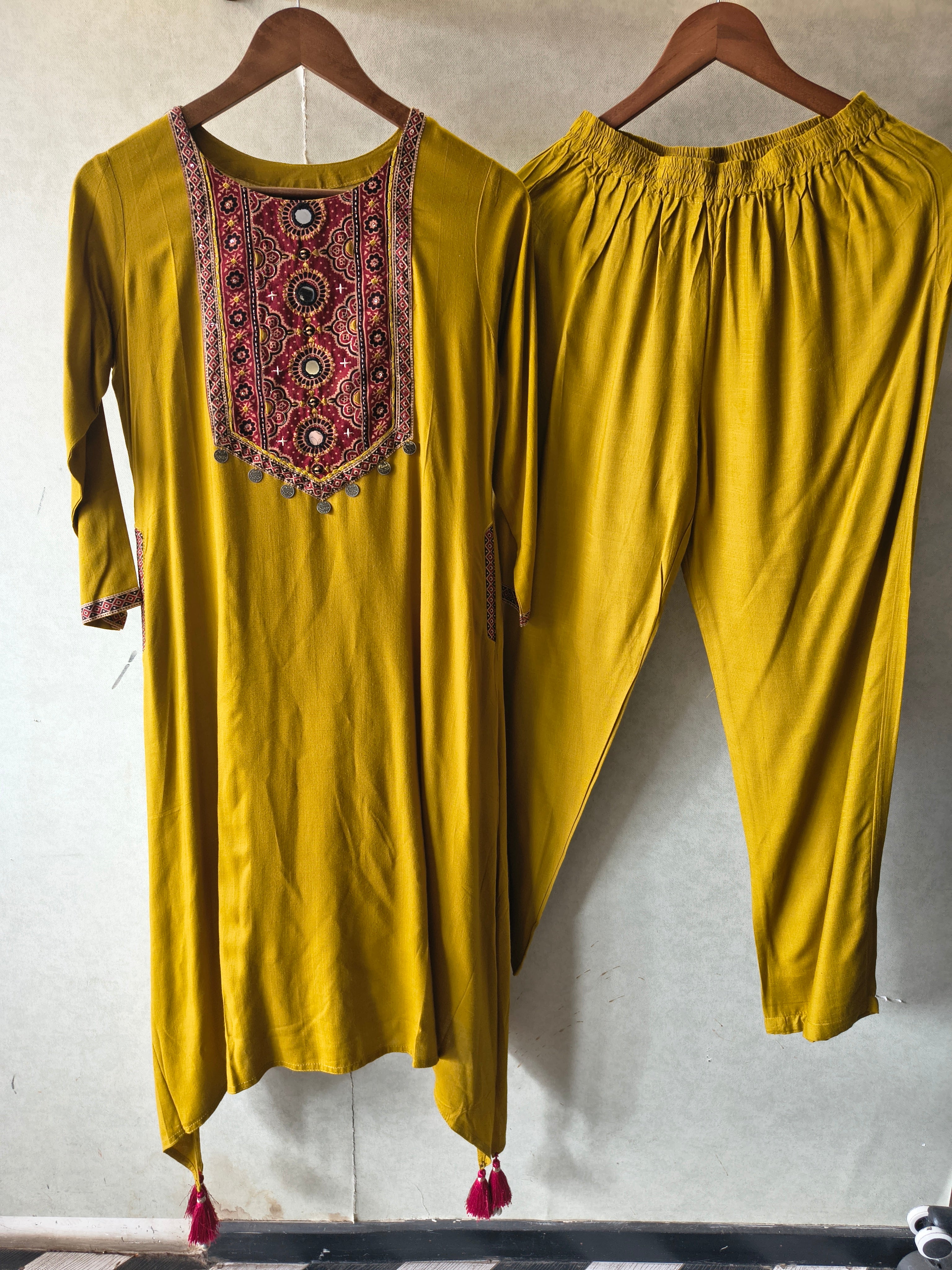 Image of Premium Mustard Ethnic Printed Yoke Kurta Pant Co-Ord Set with Tassel Hem