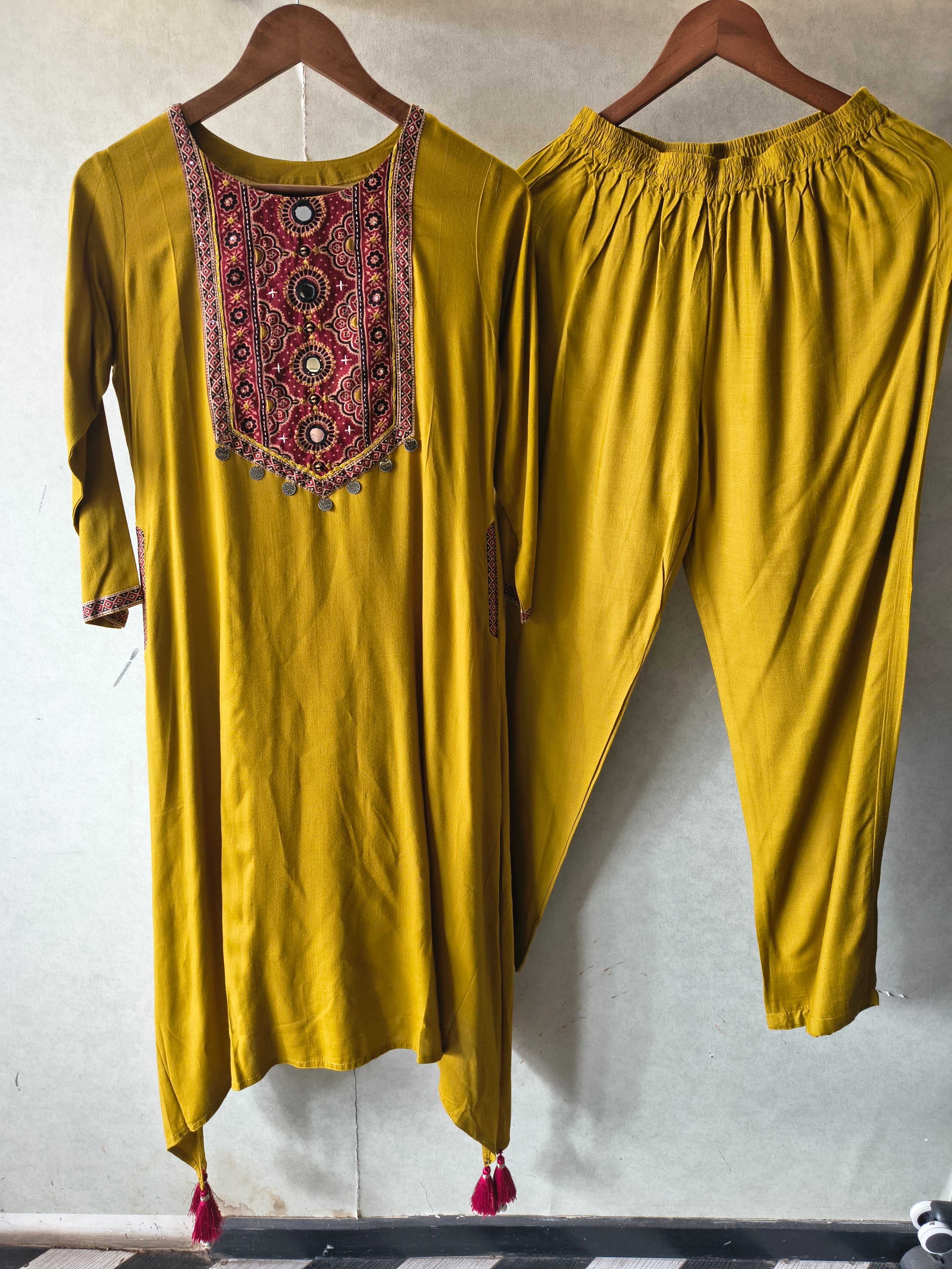 Image of Premium Mustard Ethnic Printed Yoke Kurta Pant Co-Ord Set with Tassel Hem