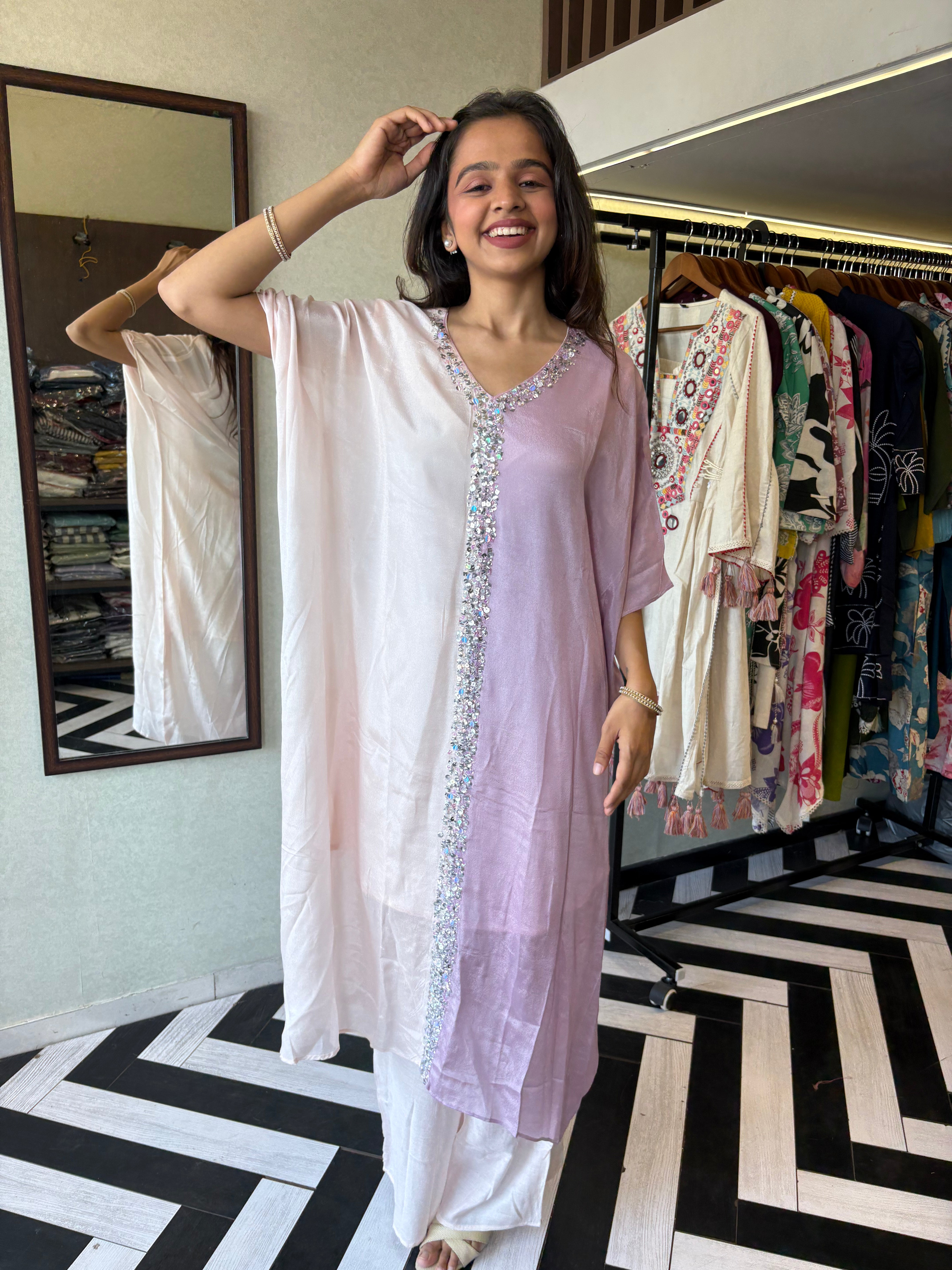Image of Turn heads in this elegant 3-piece Indo-Western beauty crafted from pure crepe with a silk base - featuring:

Gorgeous double-shade rose color

Center hand-sequence work that glistens with grace