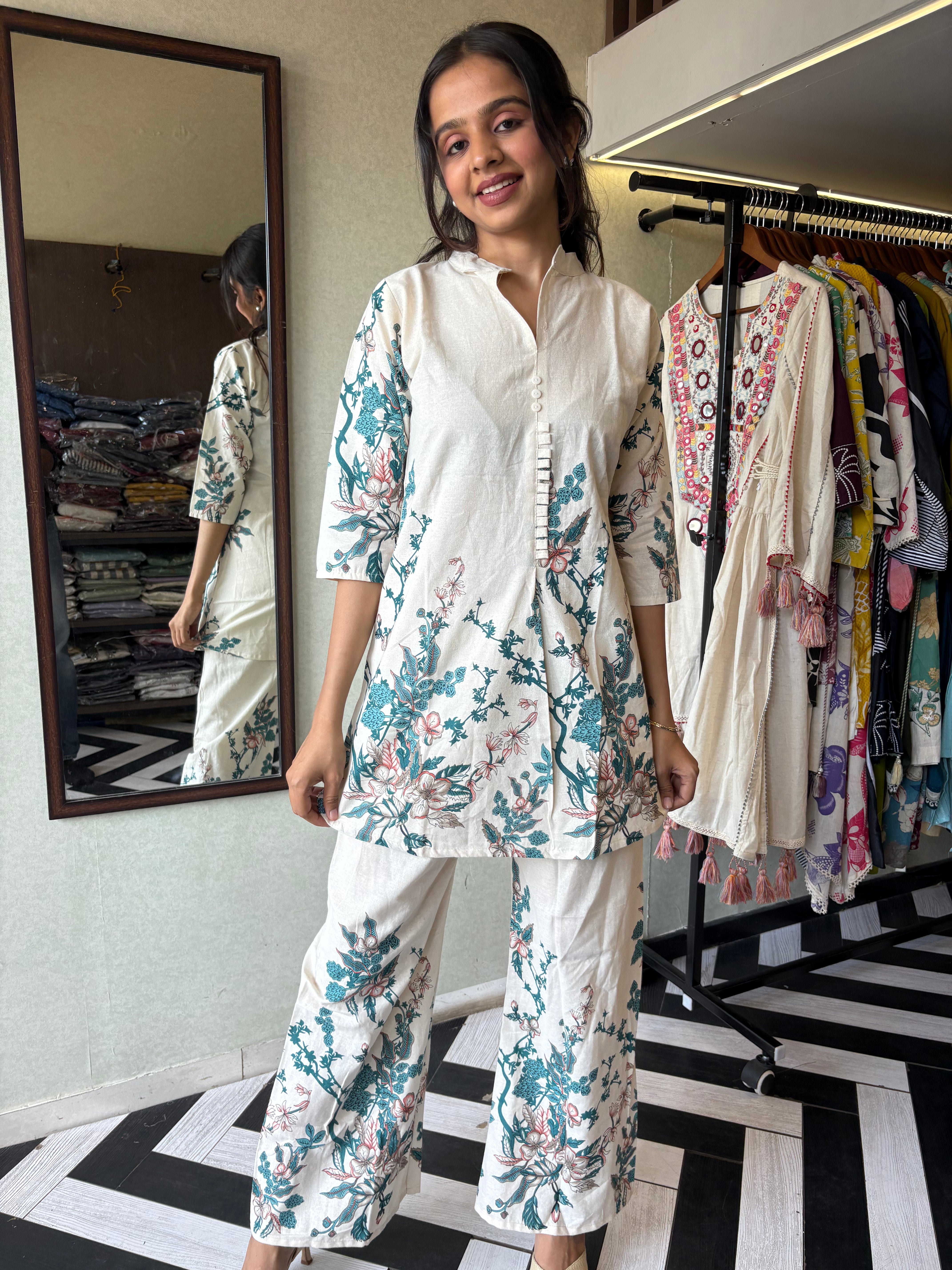 Image of This pure cotton co-ord set in a designer white print is your summer savior - soft on the skin, bold on fashion