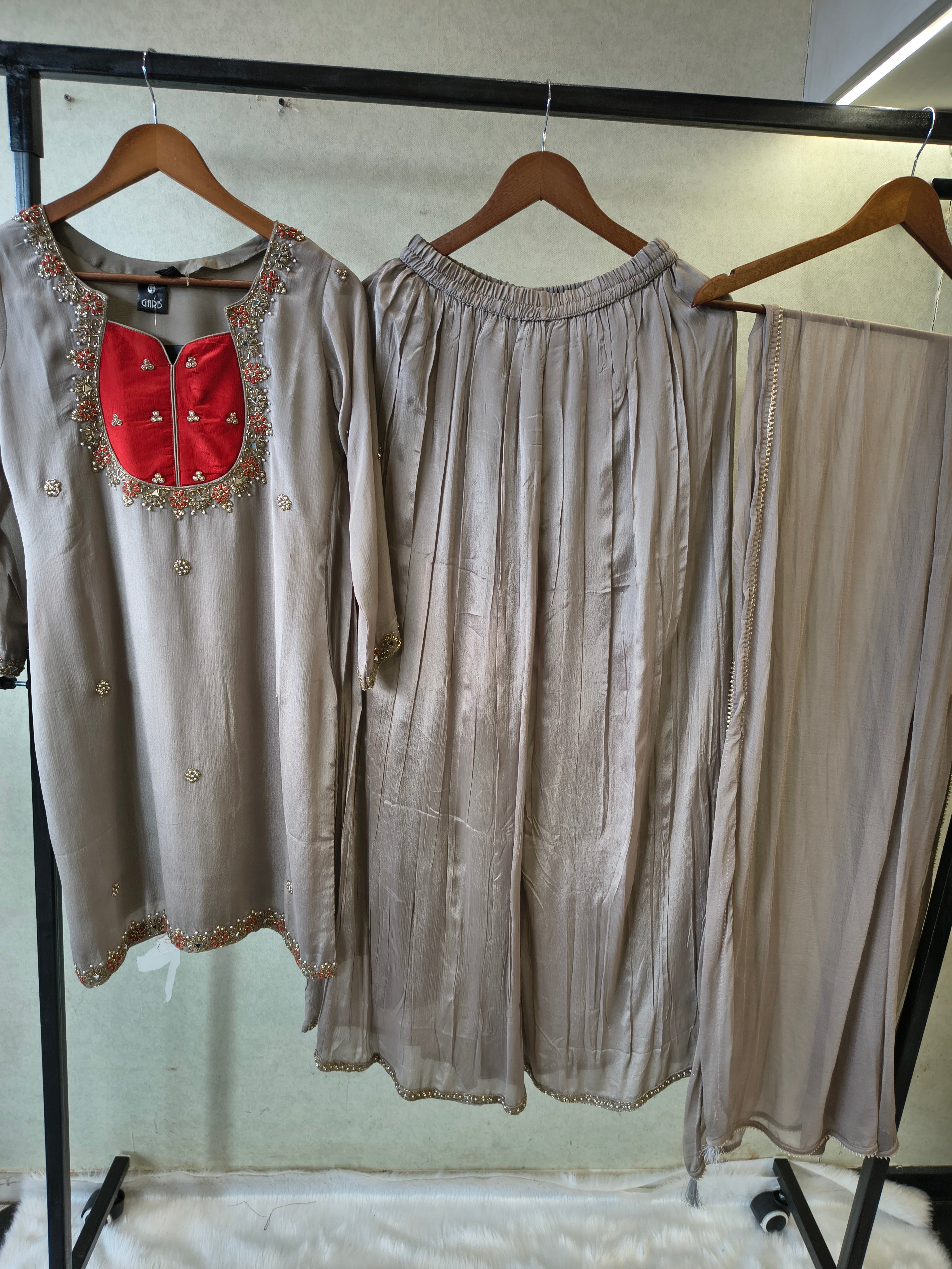 Image of Pearl Grey Embellished Straight Kurta Set with Handcrafted Neckline, Wide Palazzo & Chiffon Dupatta | Premium 3 Piece Festive Ensemble