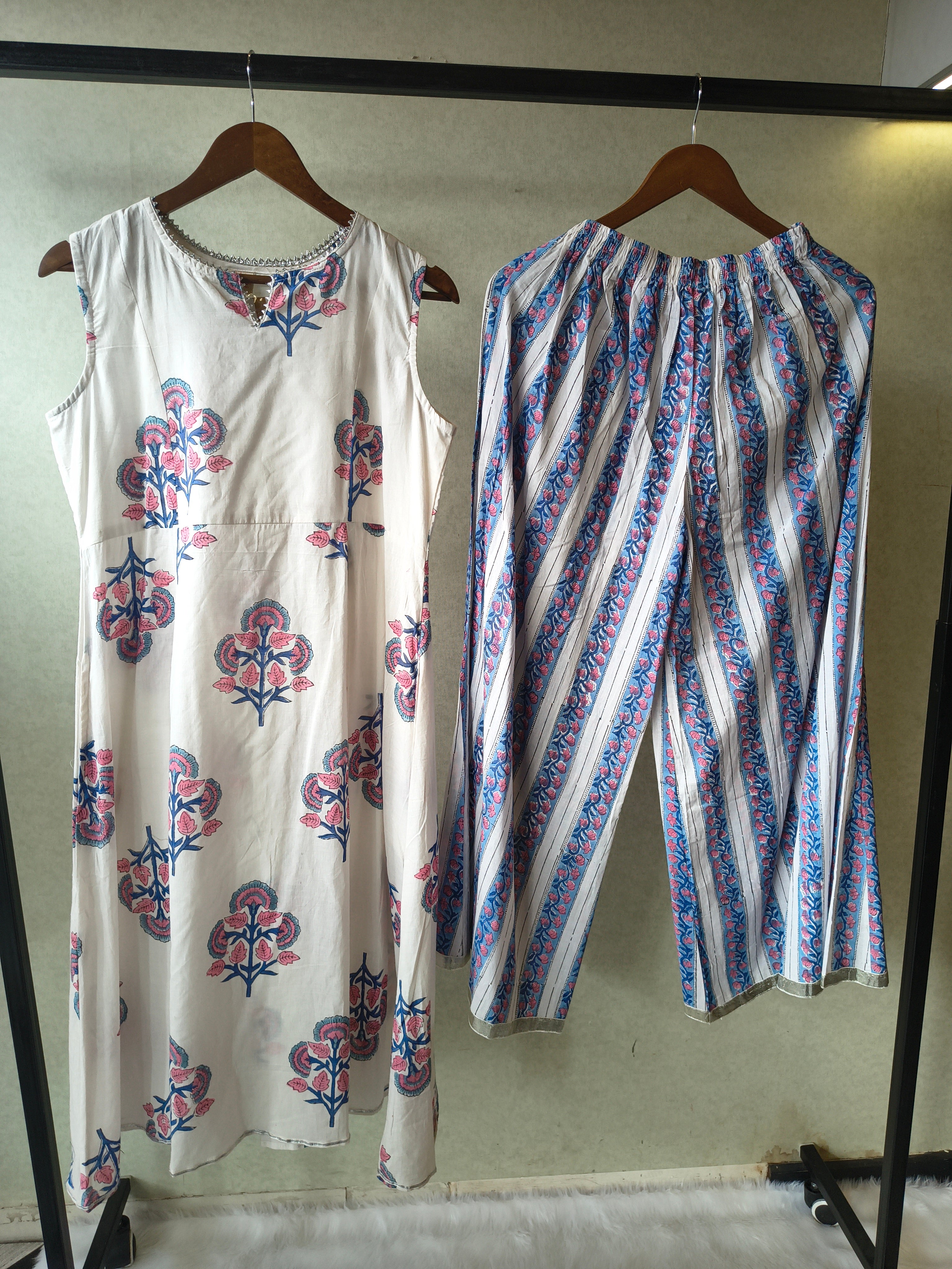 Image of Premium Ivory Floral Block Print Sleeveless Kurta with Printed Palazzo Pants Co-Ord Set