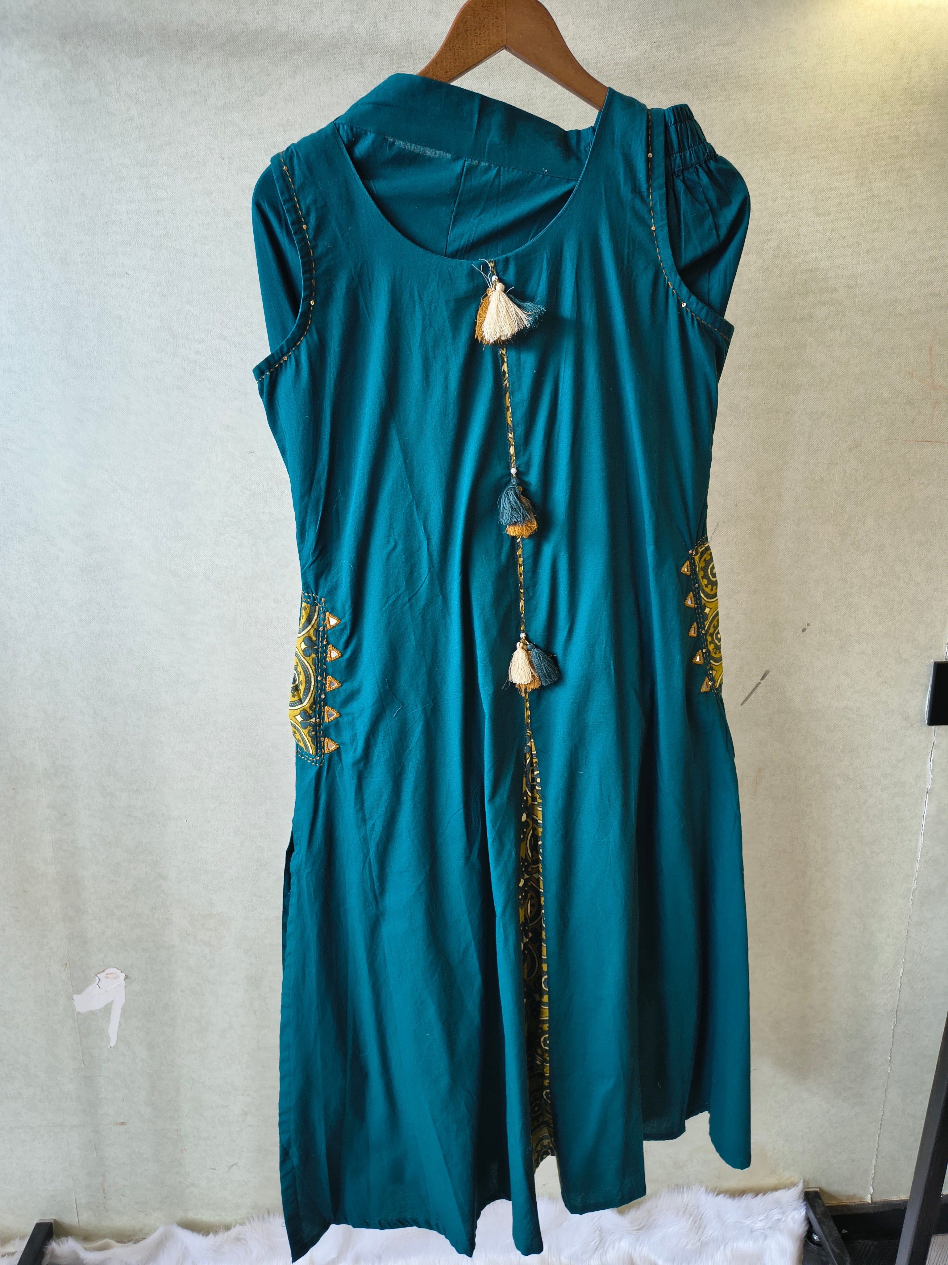 Image of Teal Sleeveless A-Line Kurta Set with Printed Panel & Straight Pants