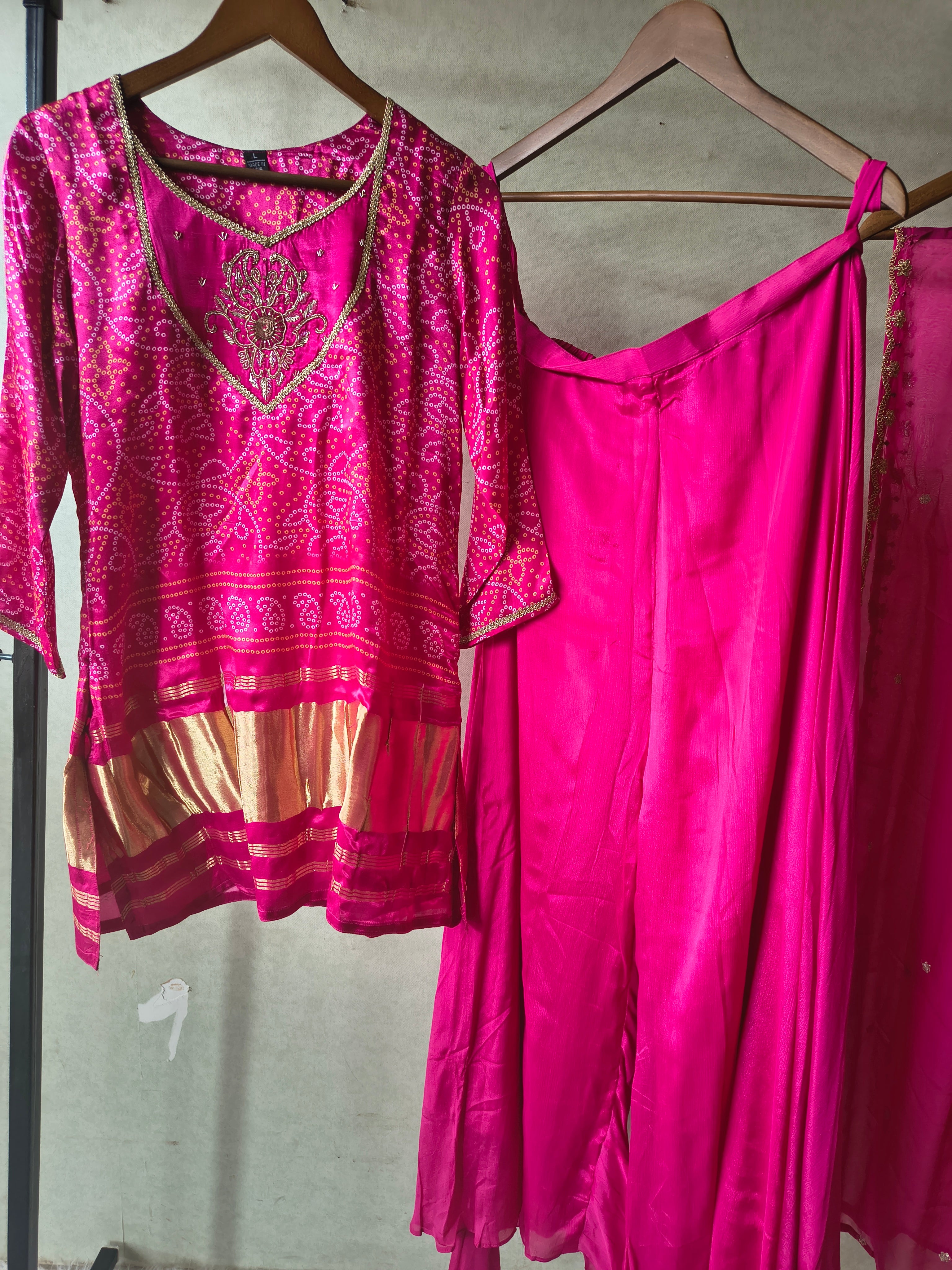 Image of Rani Pink Bandhani Sharara Set with Zari Border & Embroidered Dupatta – Premium 3 Piece Festive Ensemble