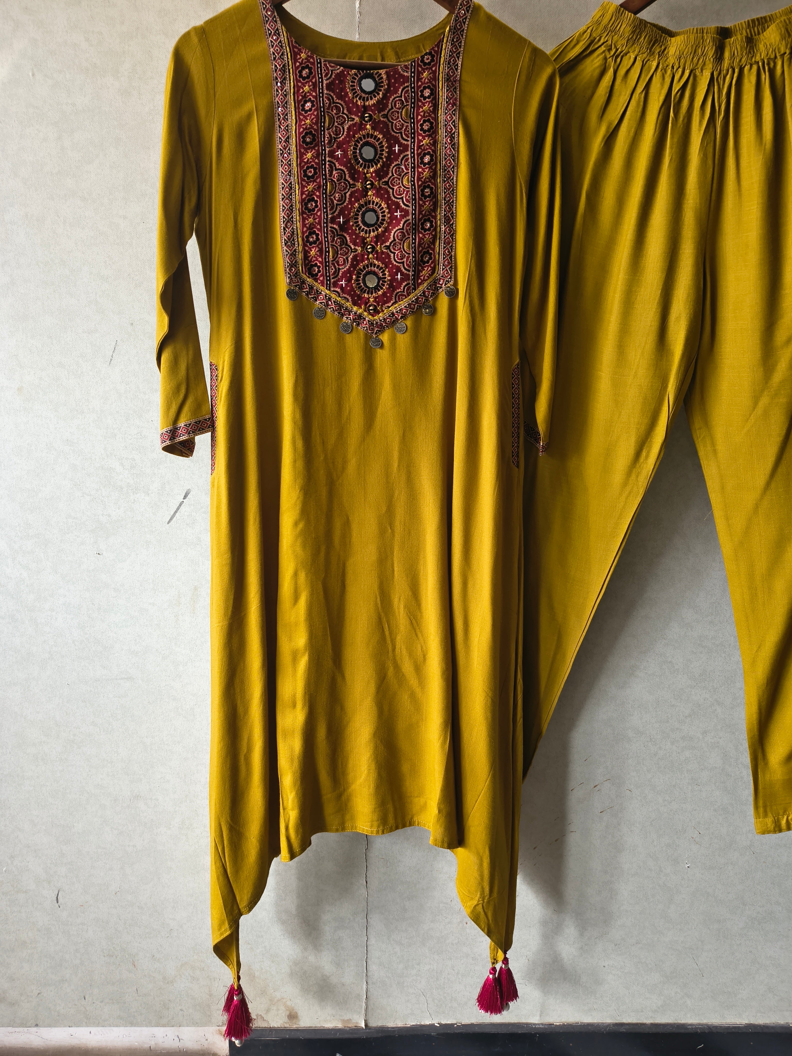 Image of Premium Mustard Ethnic Printed Yoke Kurta Pant Co-Ord Set with Tassel Hem