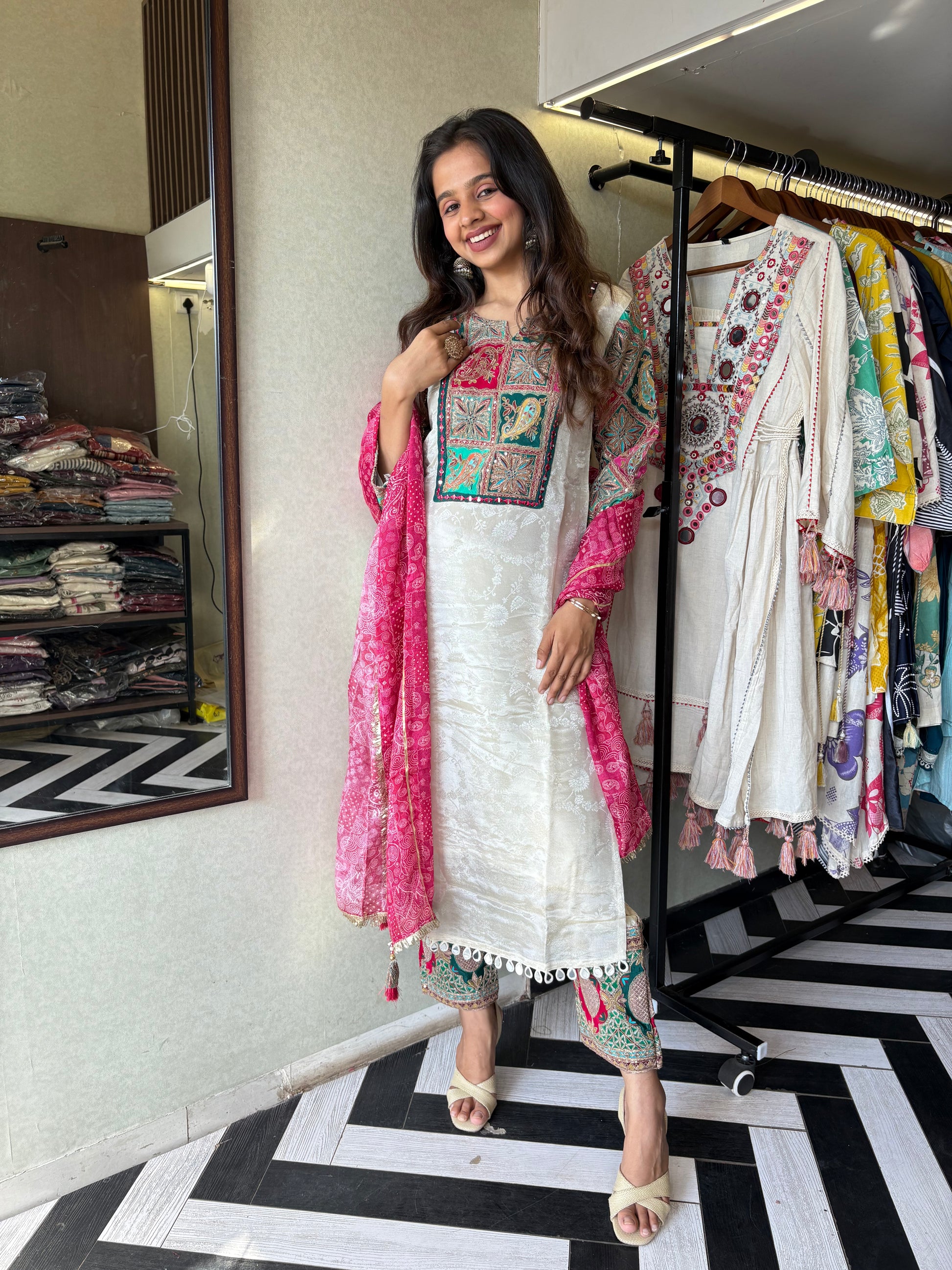 This pure cotton co-ord set in a designer white print is your summer savior - soft on the skin, bold on fashion