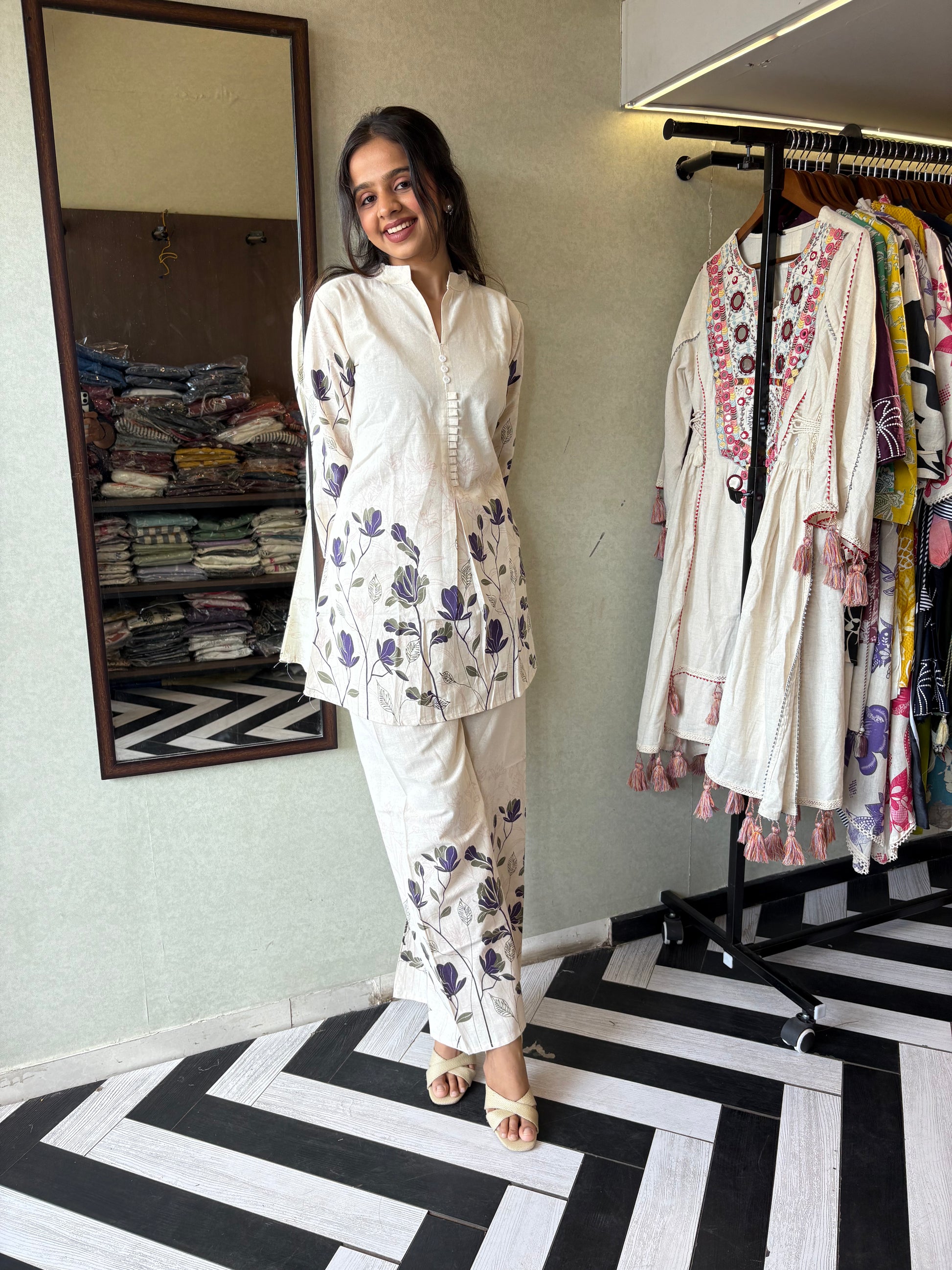 This pure cotton co-ord set in a designer white print is your summer savior - soft on the skin, bold on fashion