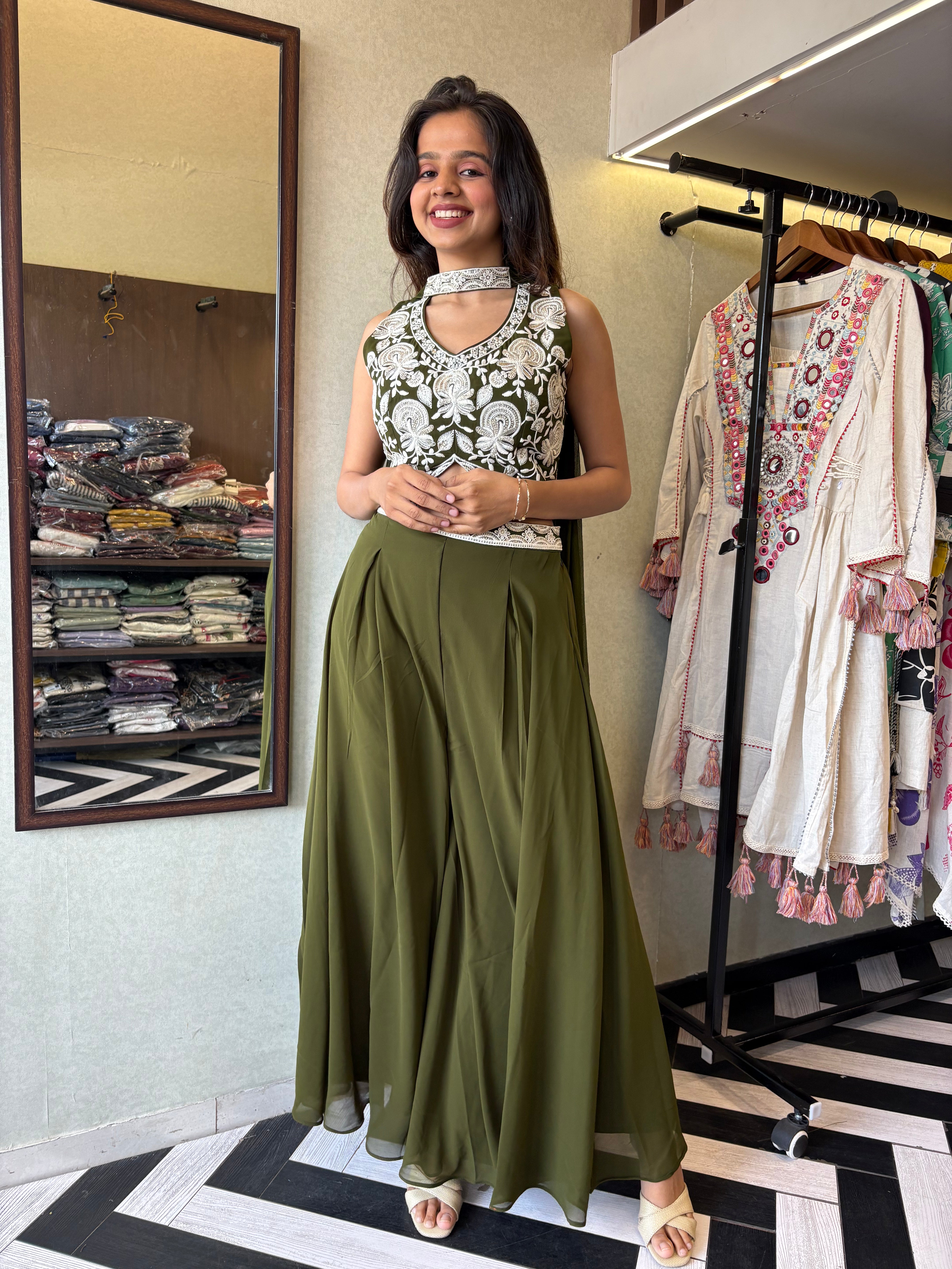 Our 2-piece Indo-Western stunner - crafted in pure georgette with a fully embroidered blouse and a beautifully flowing drape-style bottom that blends Indian grace with modern charm!