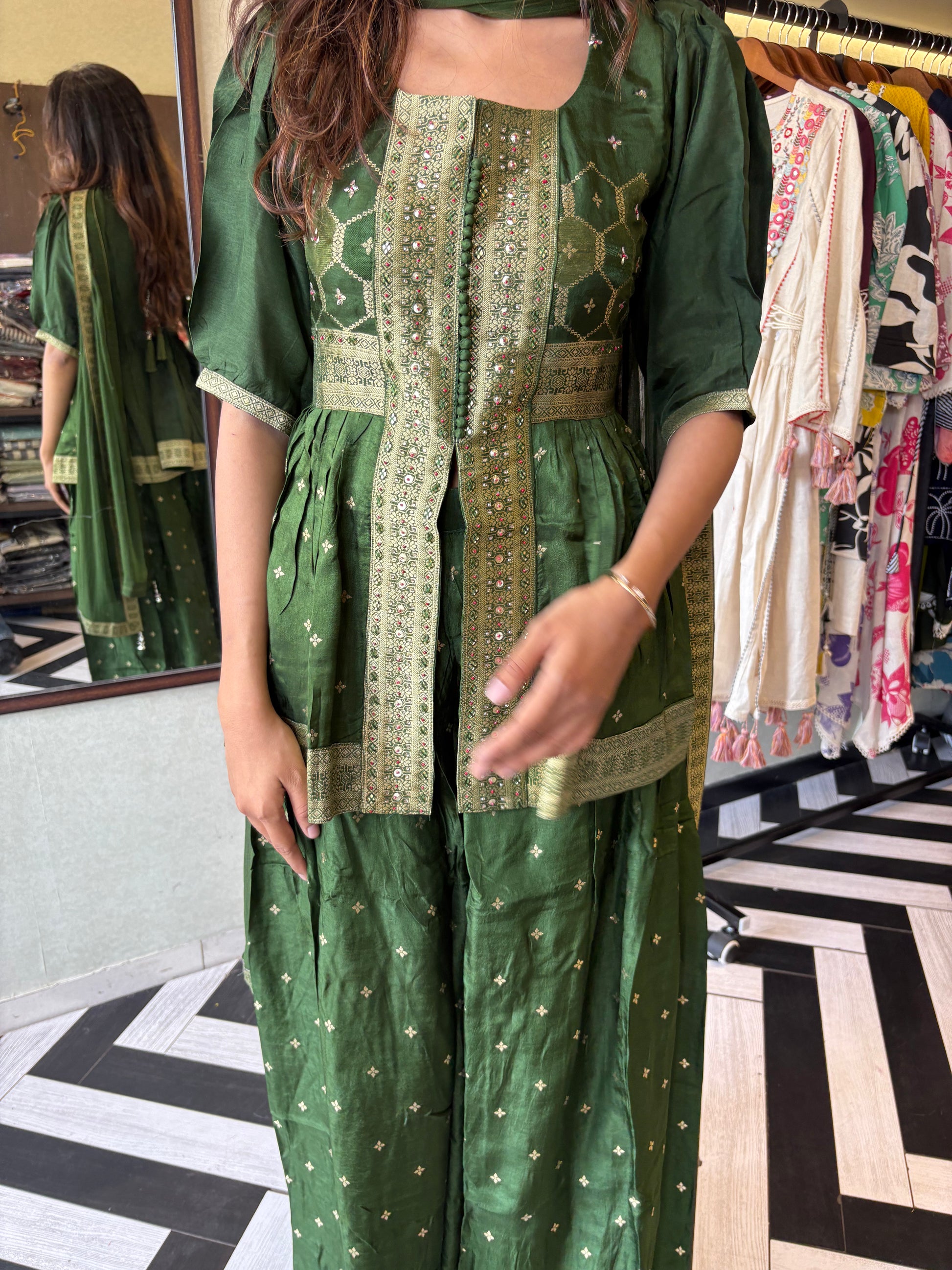 our premium pure silk 3-piece Indo-Western set in stunning green! From dazzling mirror & handwork on the jacket-style top to the flowing plazzo and dupatta