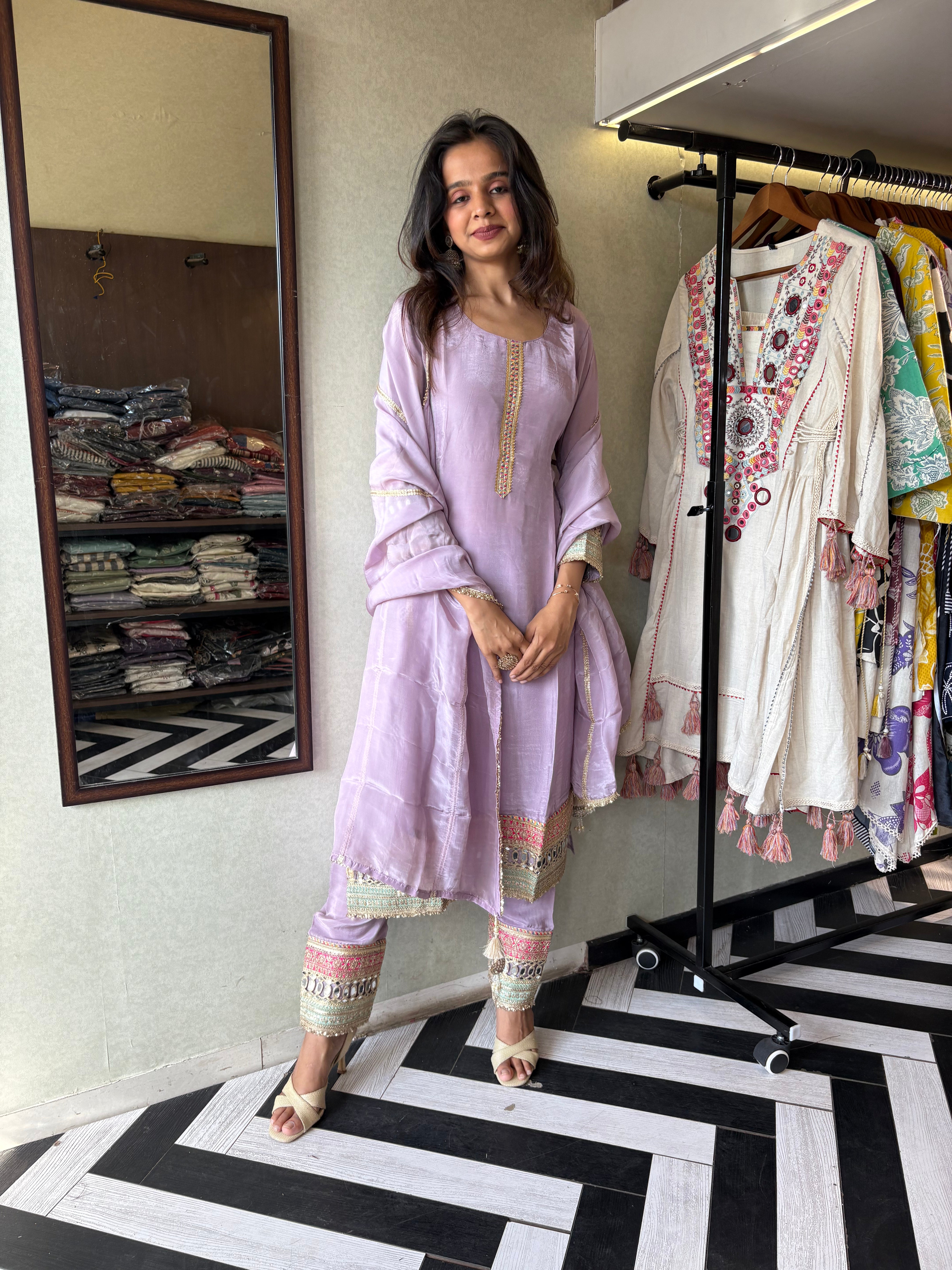 Shine Bright in Royal Magenta!

Crafted in pure silk crepe, this designer straight-cut kurti set is finished with mirror handwork on sleeves and pant ends - a perfect blend of subtle glam and timeless class.