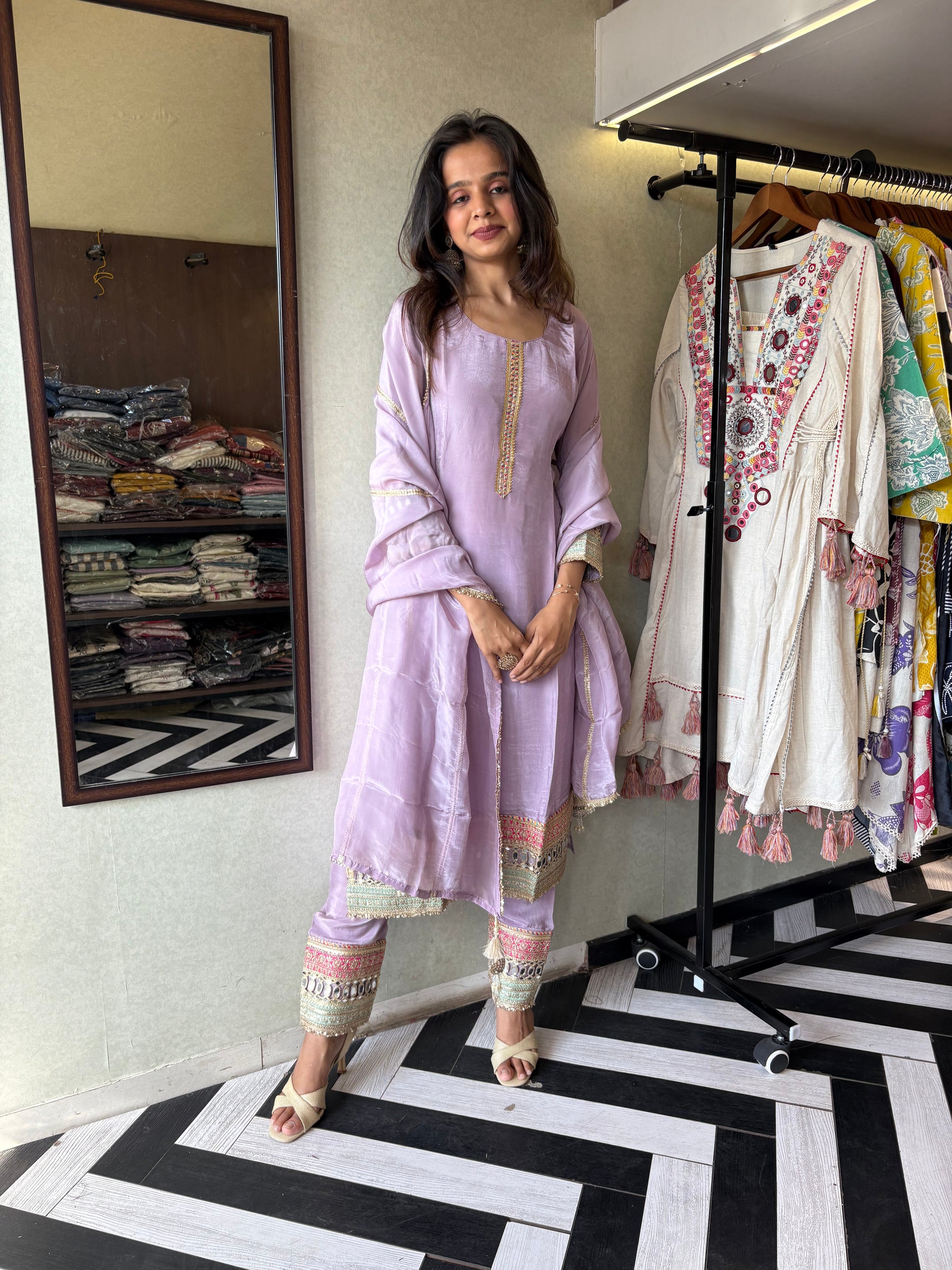 Shine Bright in Royal Magenta!

Crafted in pure silk crepe, this designer straight-cut kurti set is finished with mirror handwork on sleeves and pant ends - a perfect blend of subtle glam and timeless class.
