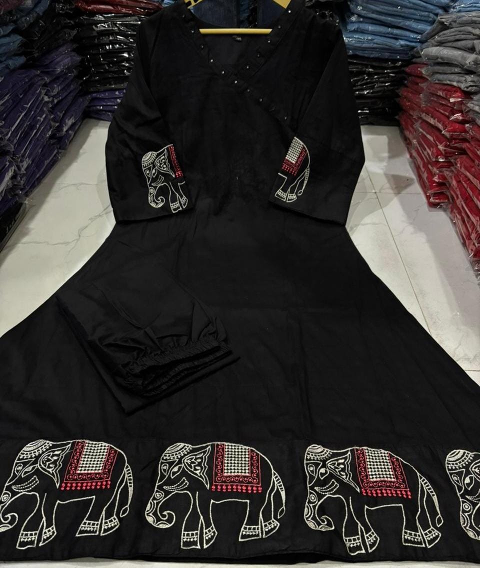 Image of Upgrade your office wear wardrobe with this classy kurti embroidery work detailing with pant for all day comfort and trendy look