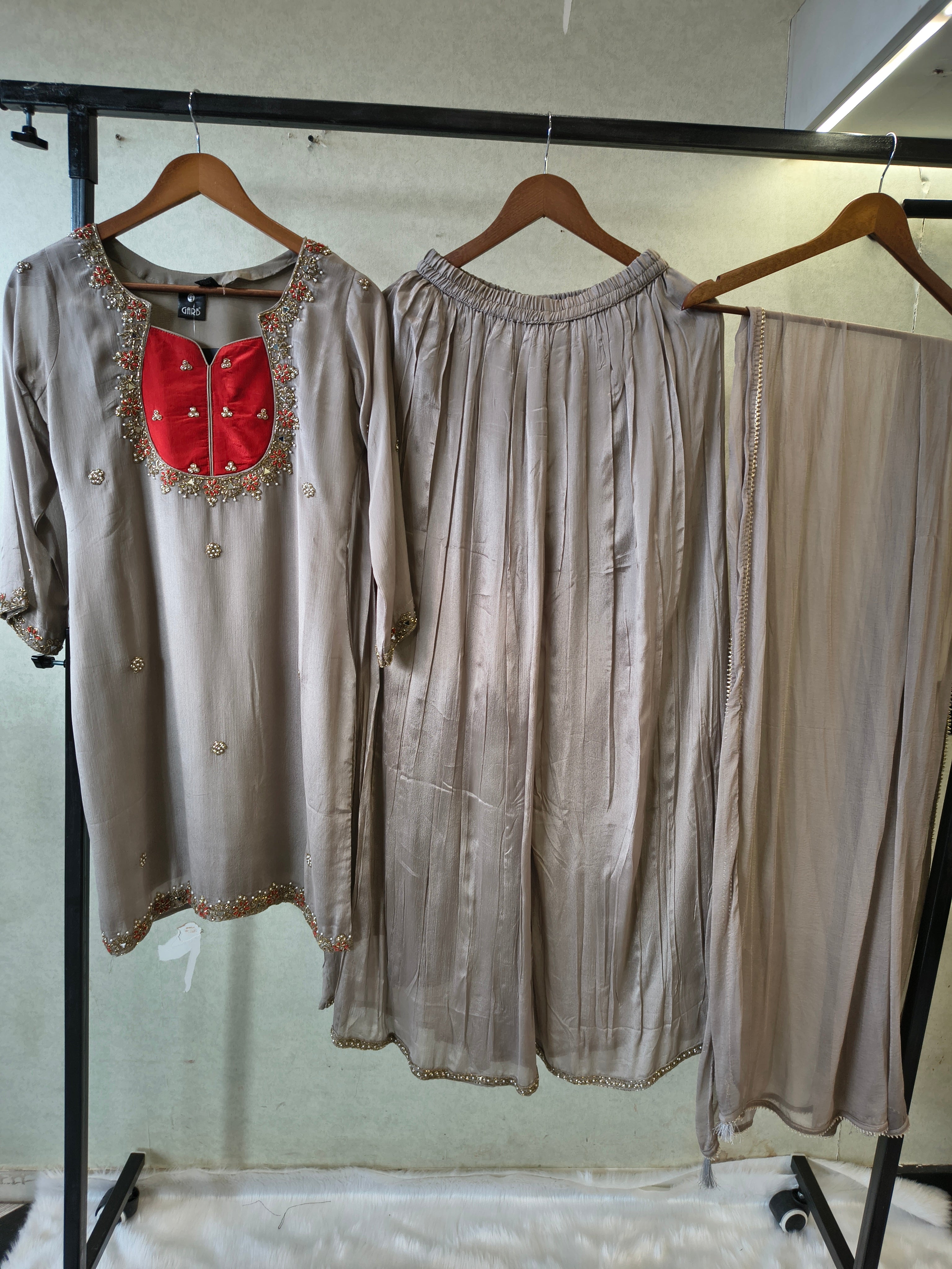 Image of Pearl Grey Embellished Straight Kurta Set with Handcrafted Neckline, Wide Palazzo & Chiffon Dupatta | Premium 3 Piece Festive Ensemble