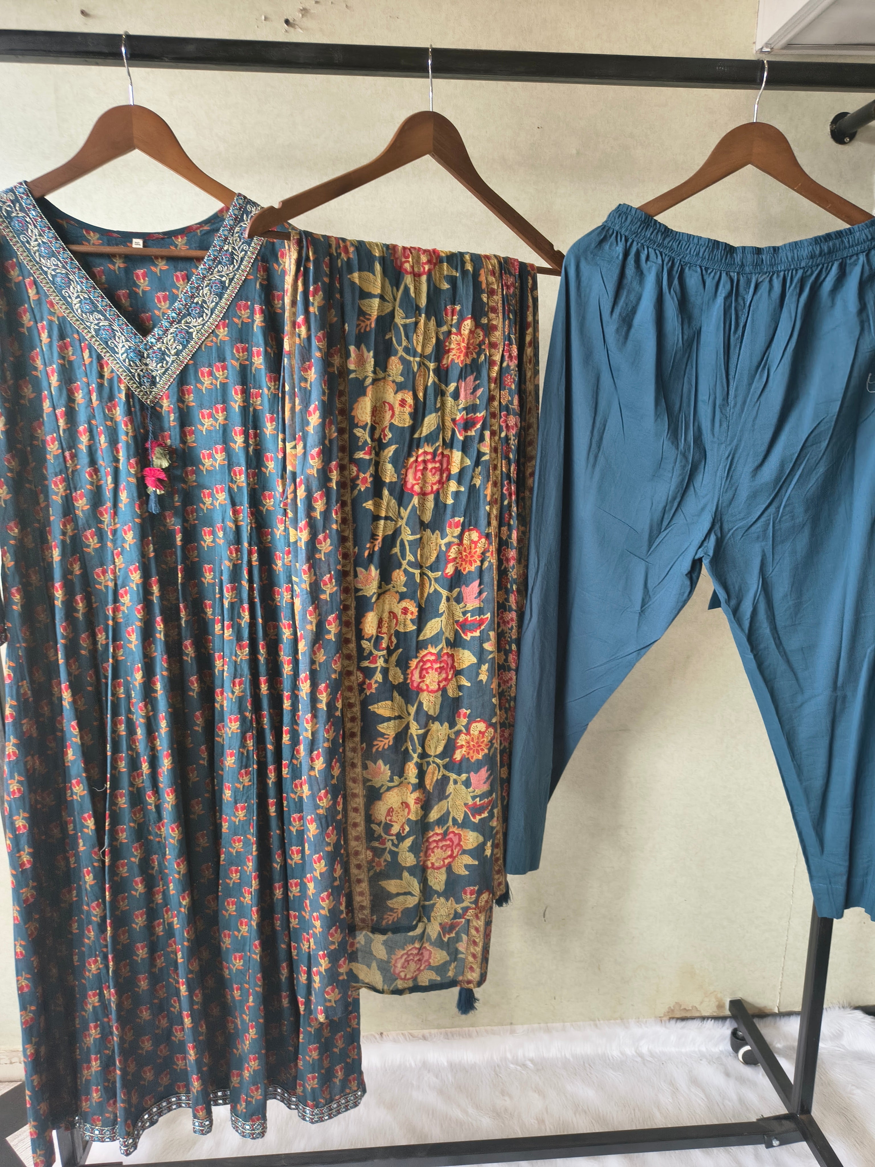 Image of Premium Teal Blue Floral Printed Anarkali Kurta Set with Embroidered V-Neck, Solid Pants & Designer Printed Dupatta
