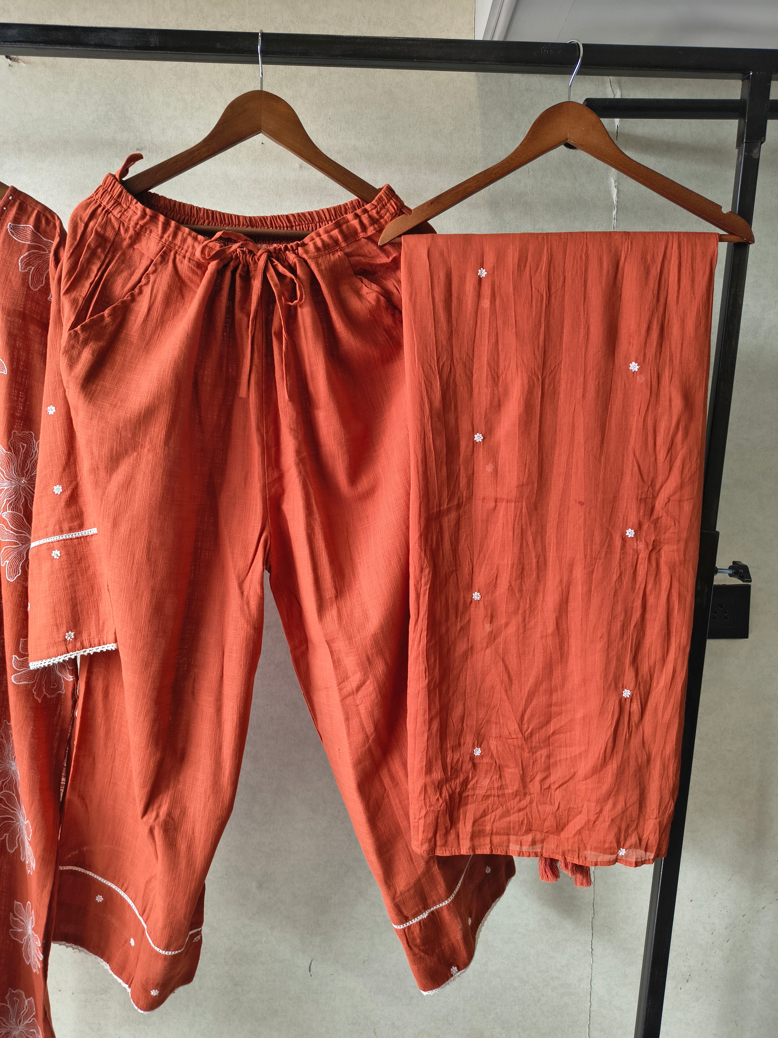 Image of Rust Orange Floral Printed Cotton Kurta Set with Solid Pants & Embroidered Dupatta