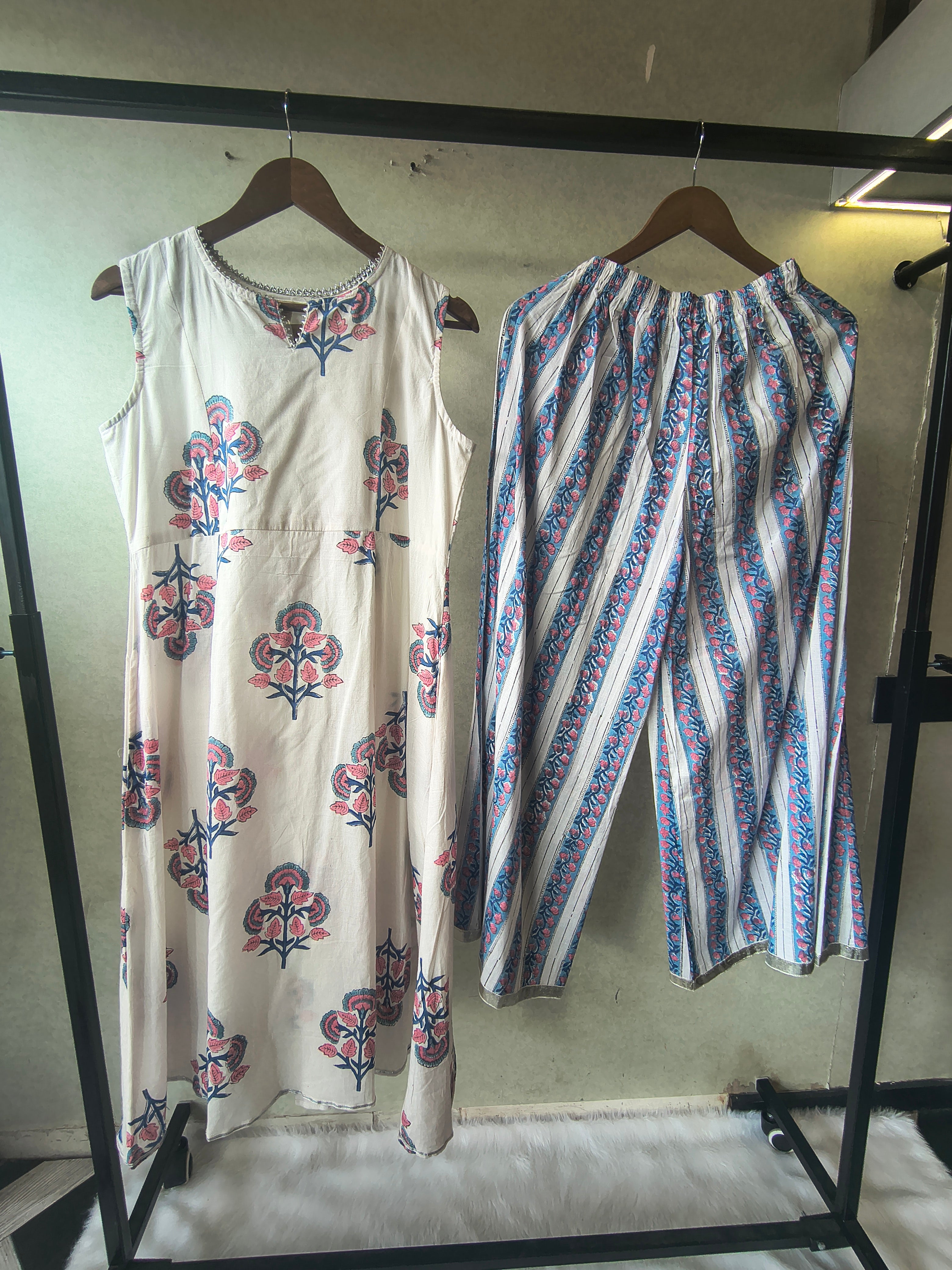 Image of Premium Ivory Floral Block Print Sleeveless Kurta with Printed Palazzo Pants Co-Ord Set