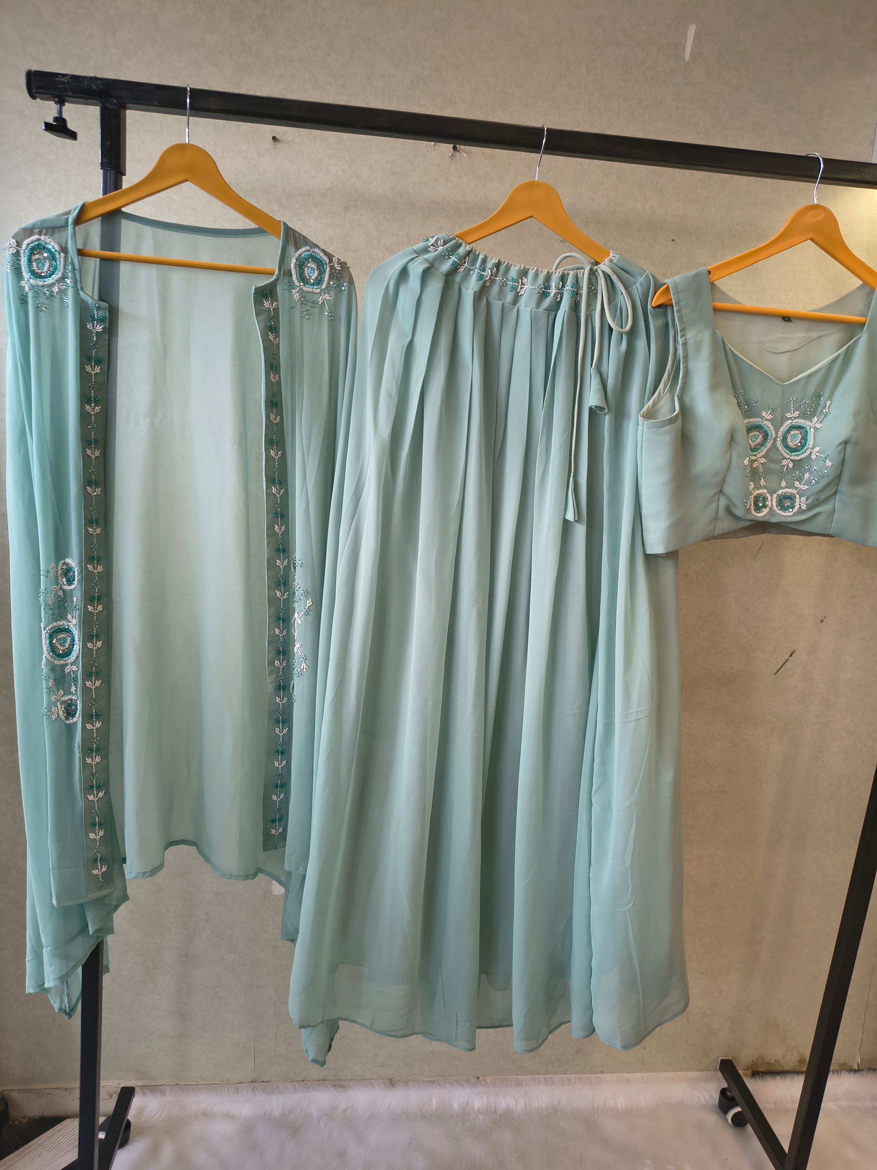 Image of Powder Blue Designer Crop Top Sharara Set with Embroidered Cape & Flared Palazzo | Premium 3 Piece Occasion Wear