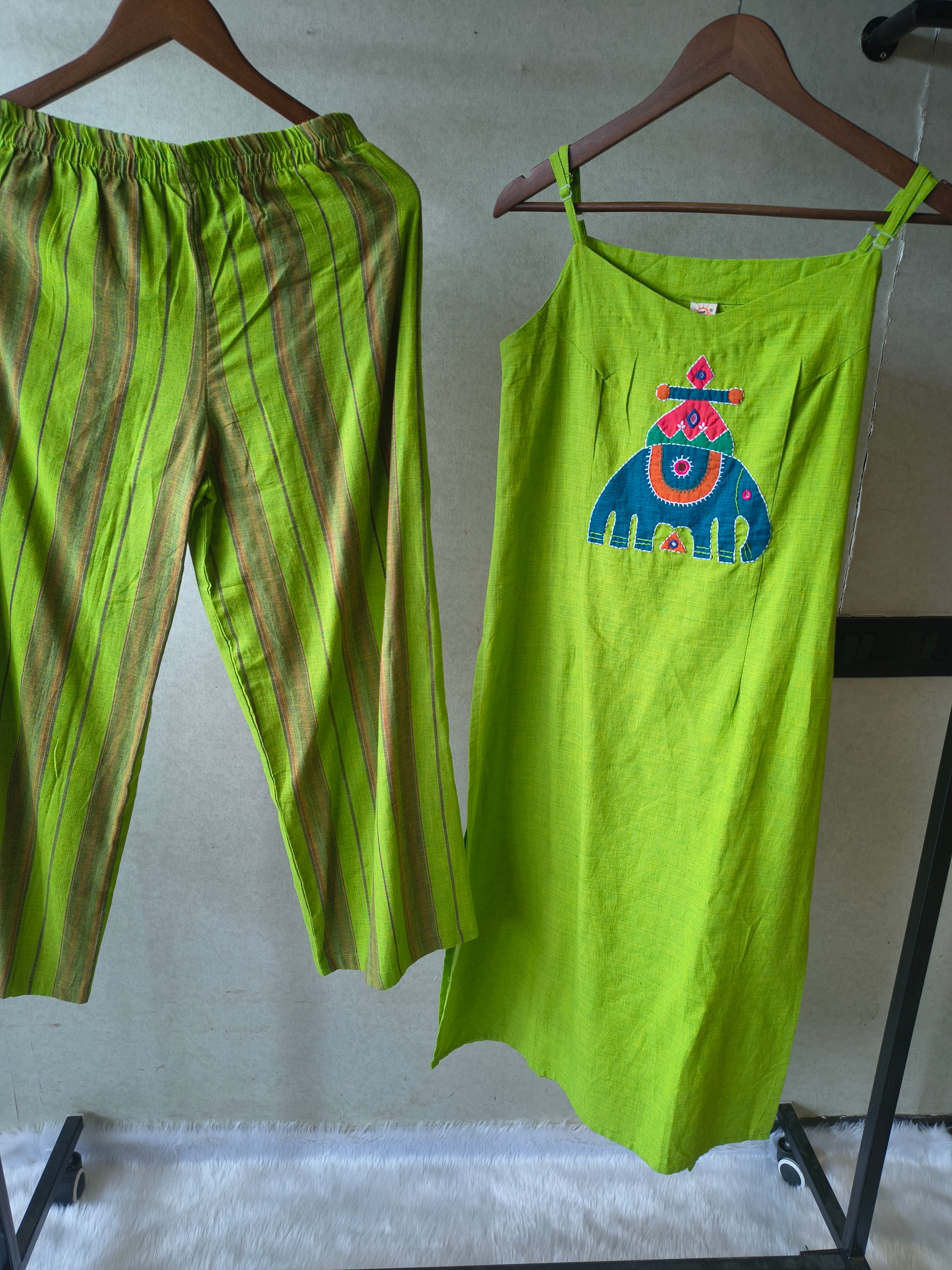 Image of Lime Green Sleeveless Cotton Kurta Set with Tribal Elephant Appliqué & Striped Straight Pants