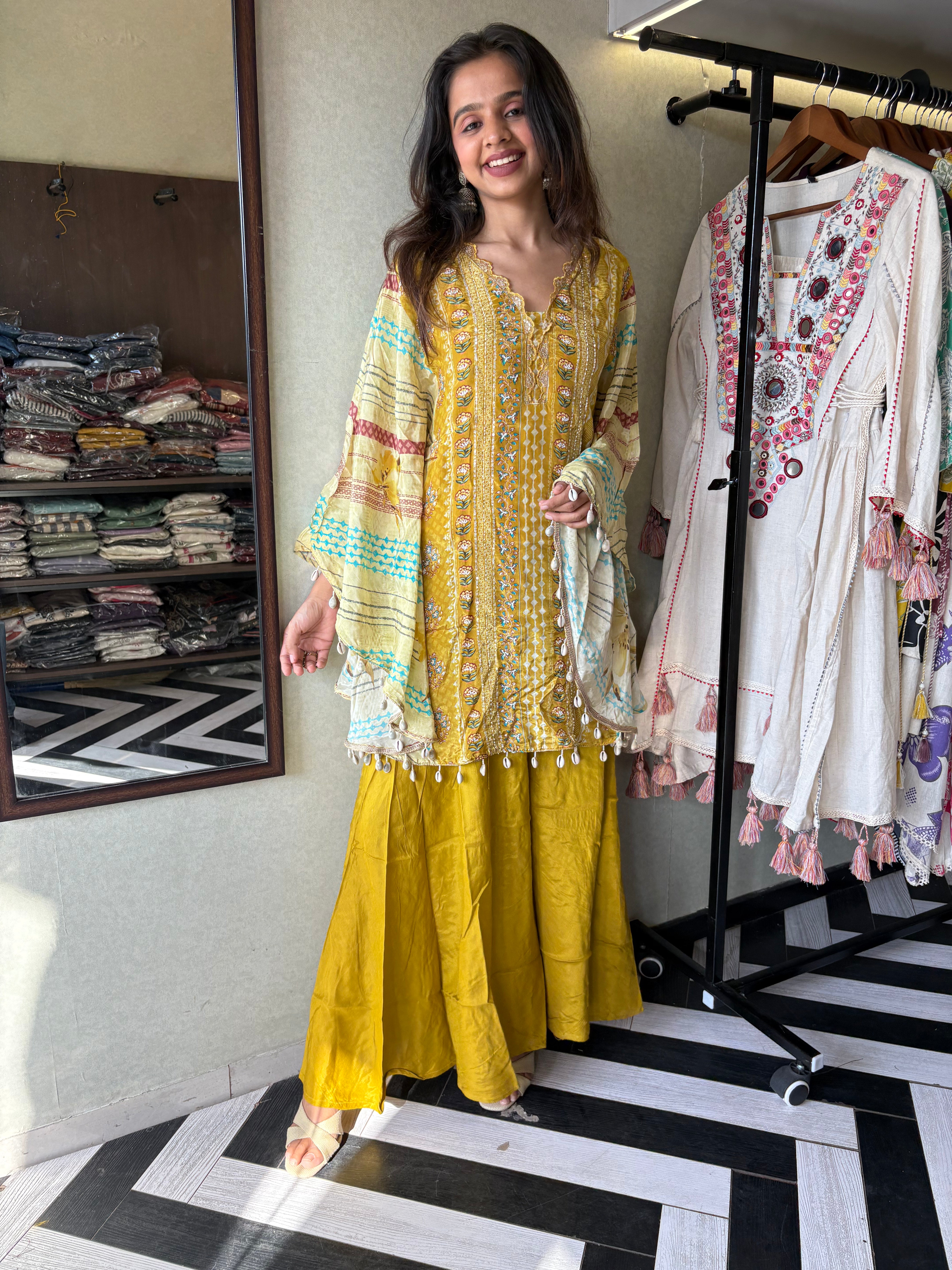 Image of Crafted from pure crepe fabric with hand-sequenced accessory work - it's the sunshine outfit your wardrobe needs!