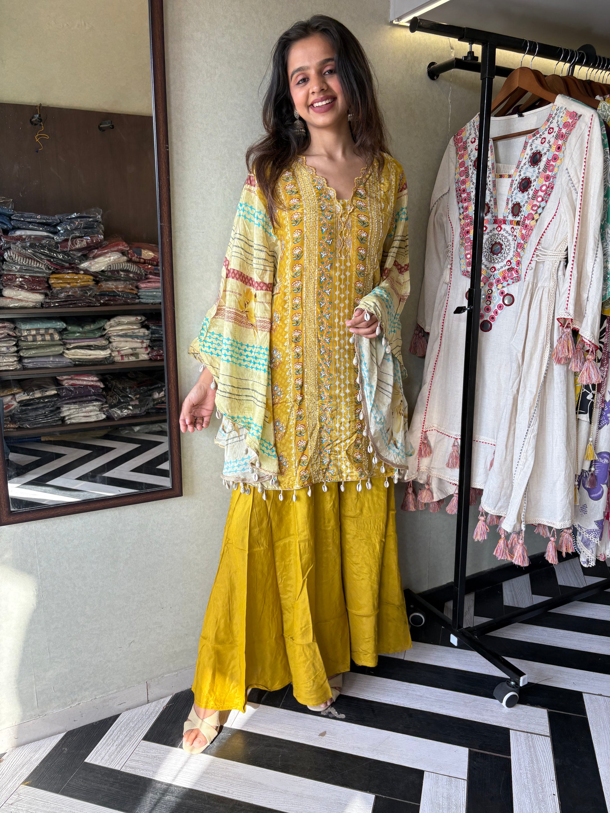 Crafted from pure crepe fabric with hand-sequenced accessory work - it's the sunshine outfit your wardrobe needs!