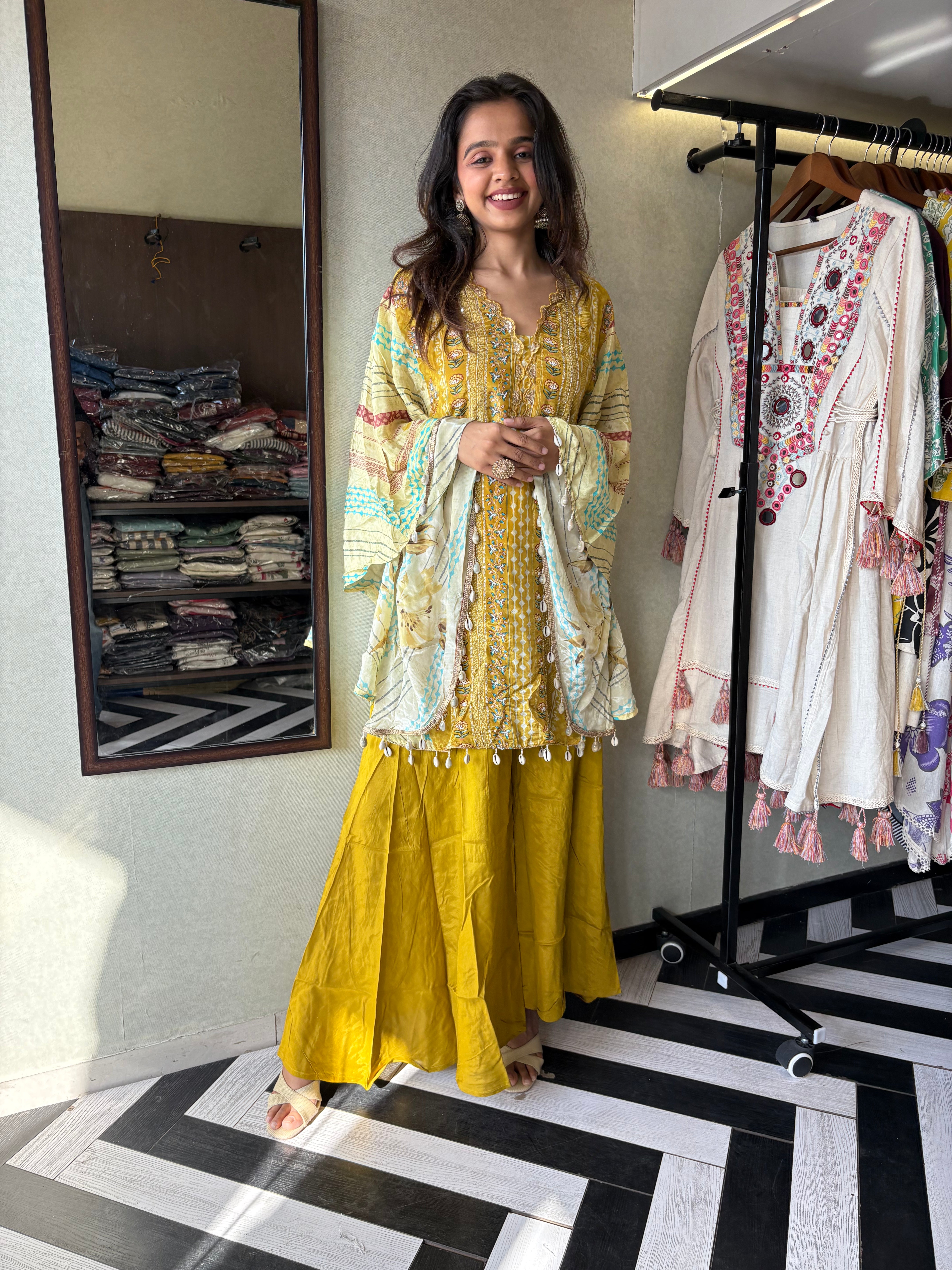 Image of Crafted from pure crepe fabric with hand-sequenced accessory work - it's the sunshine outfit your wardrobe needs!