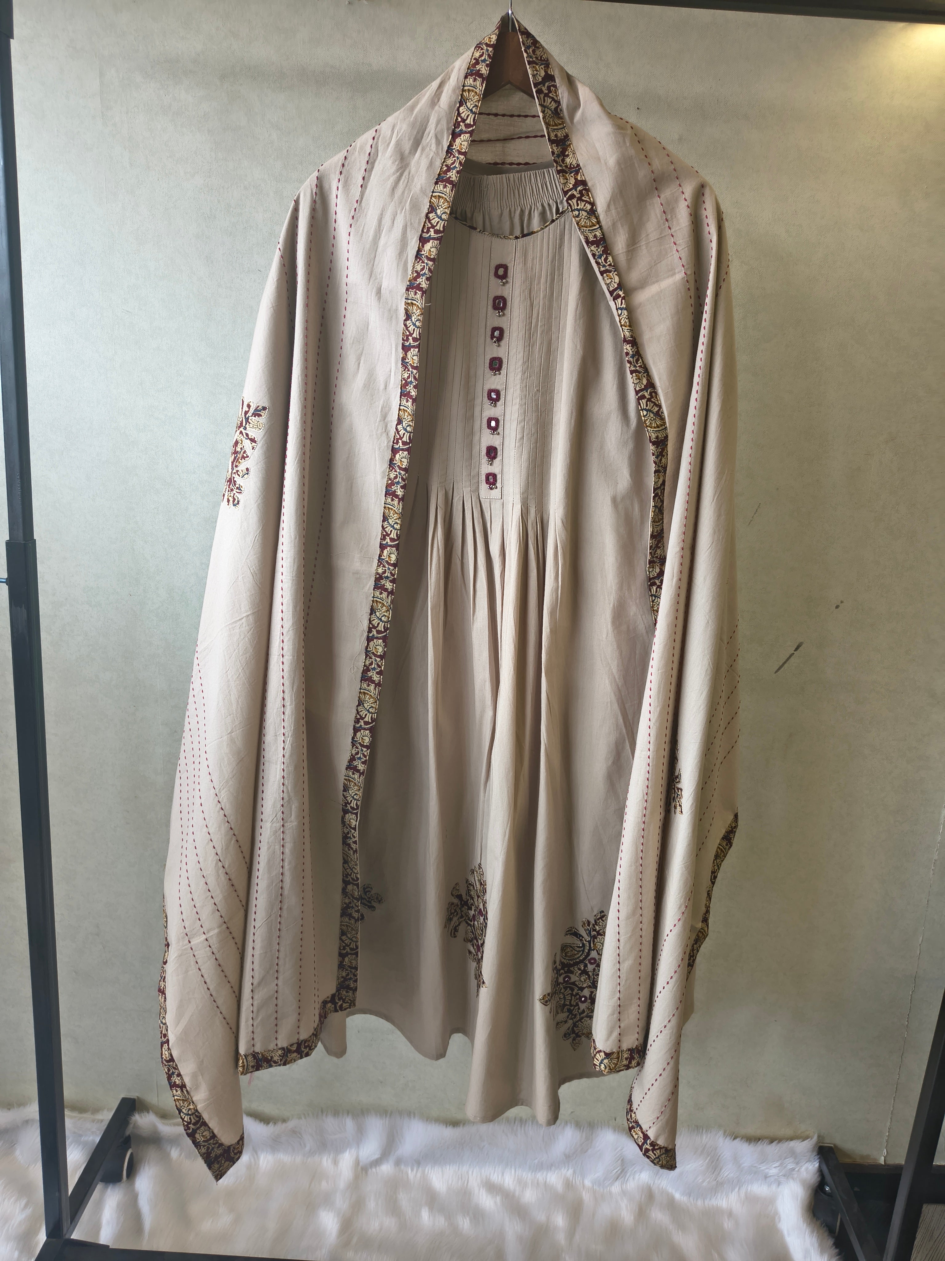 Image of Beige Embroidered Three-Piece Kurta Set with Pintuck Detailing & Designer Dupatta