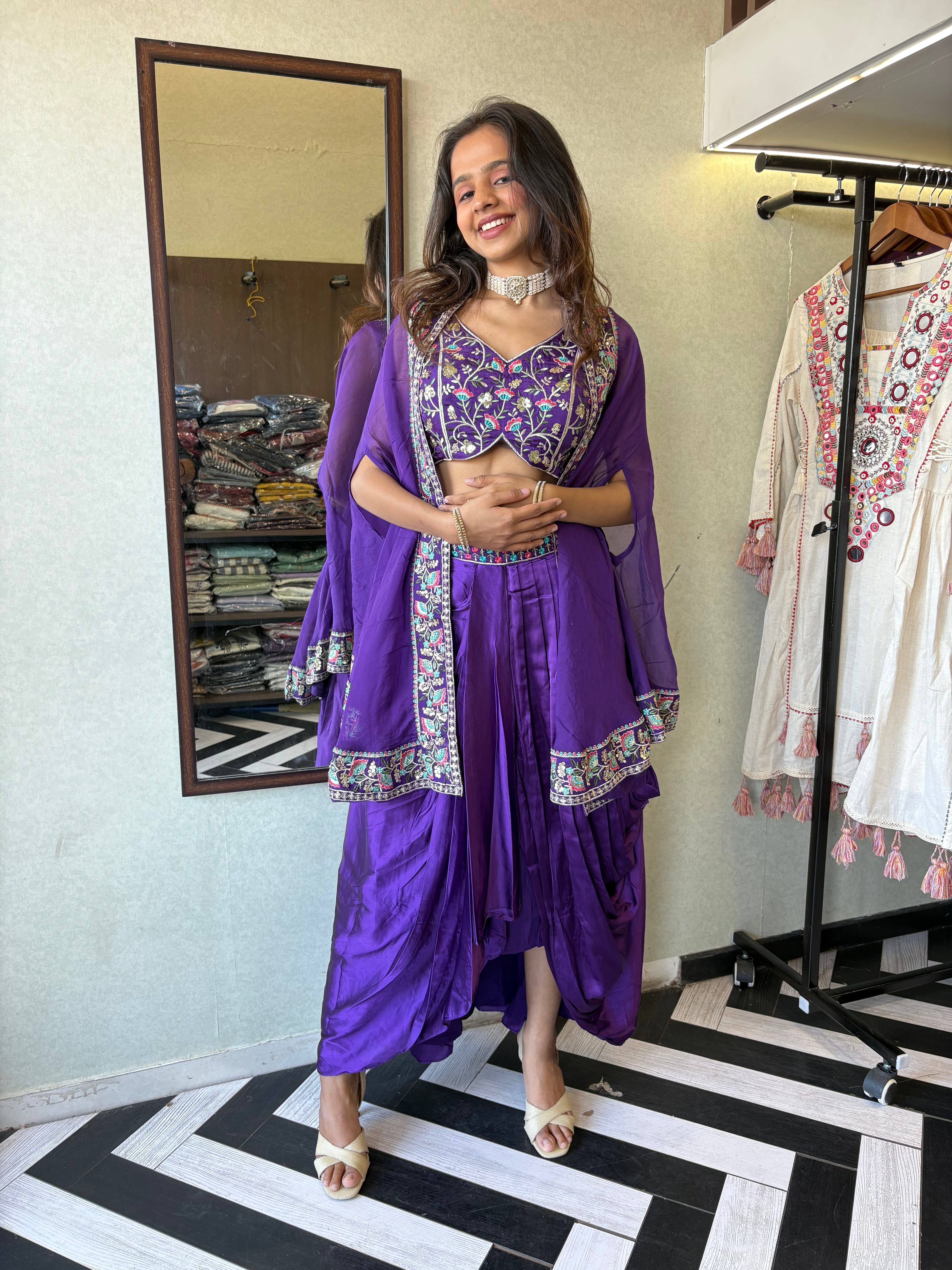 Image of Elegance, Embroidery & the Perfect Drape - All in One Look!

Make your presence unforgettable in this pure crepe purple 3-piece Indo-Western. Full hand embroidery, flawless drape, and designer finishing - this is what statement style looks like