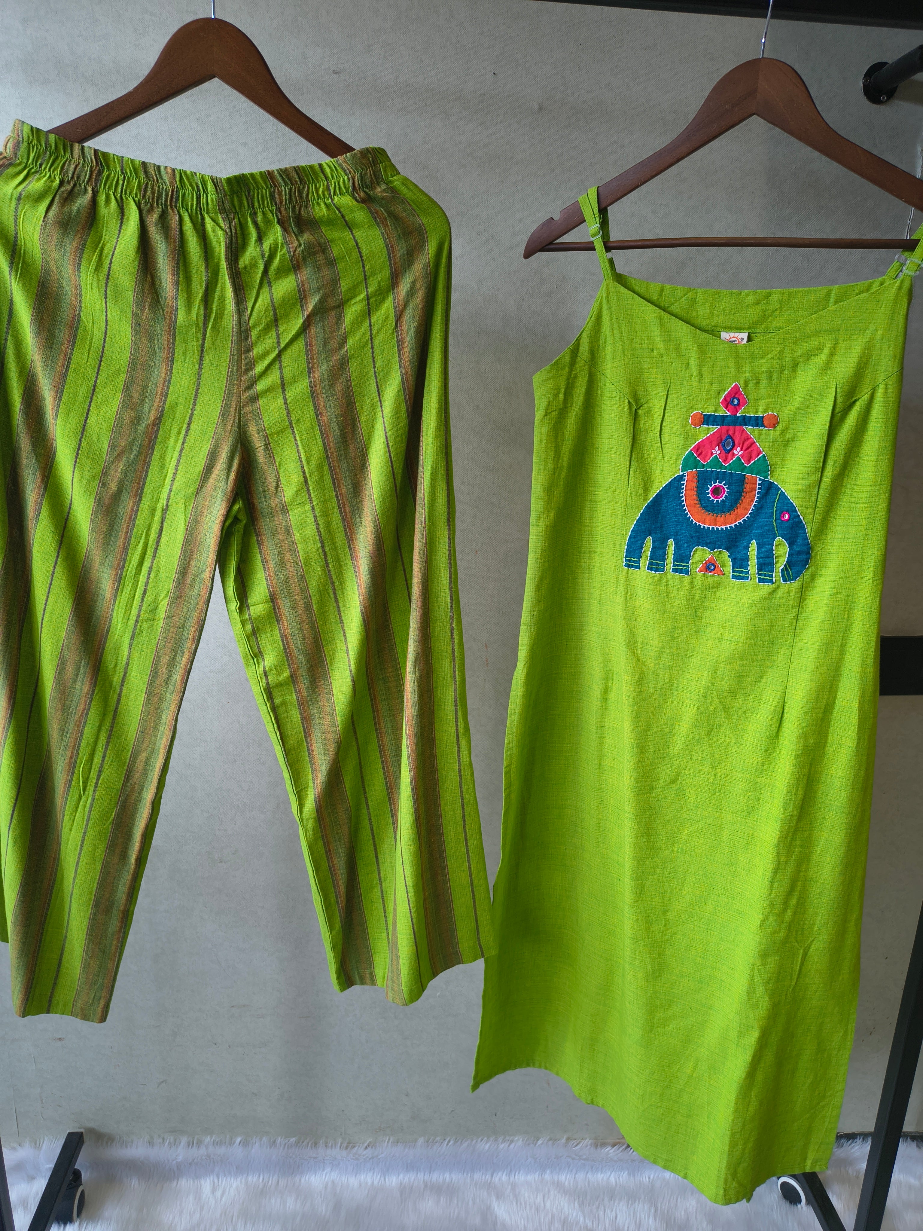 Image of Lime Green Sleeveless Cotton Kurta Set with Tribal Elephant Appliqué & Striped Straight Pants
