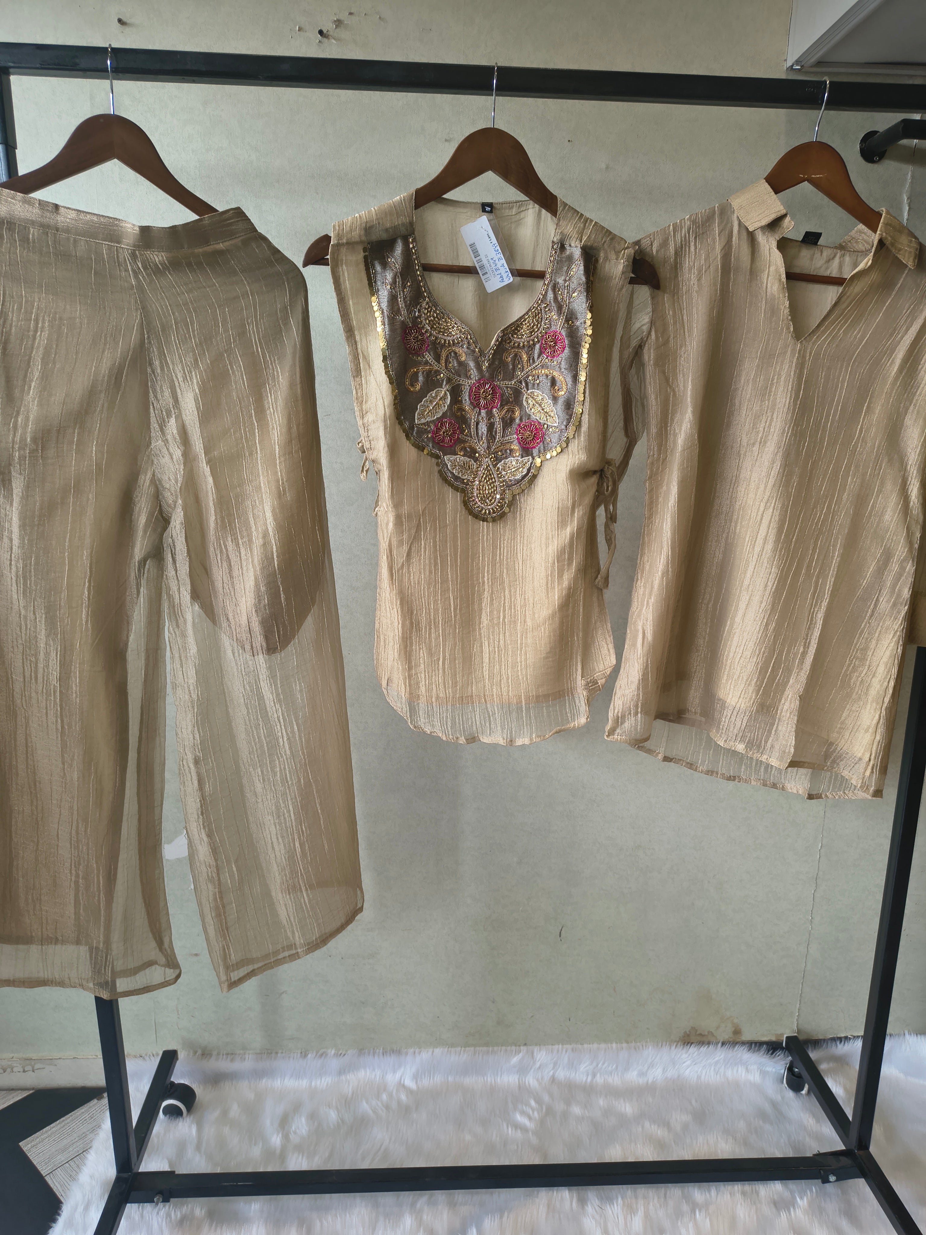 Image of Premium Champagne Tissue Silk Embroidered Kurta with Hand Embellished Statement Yoke